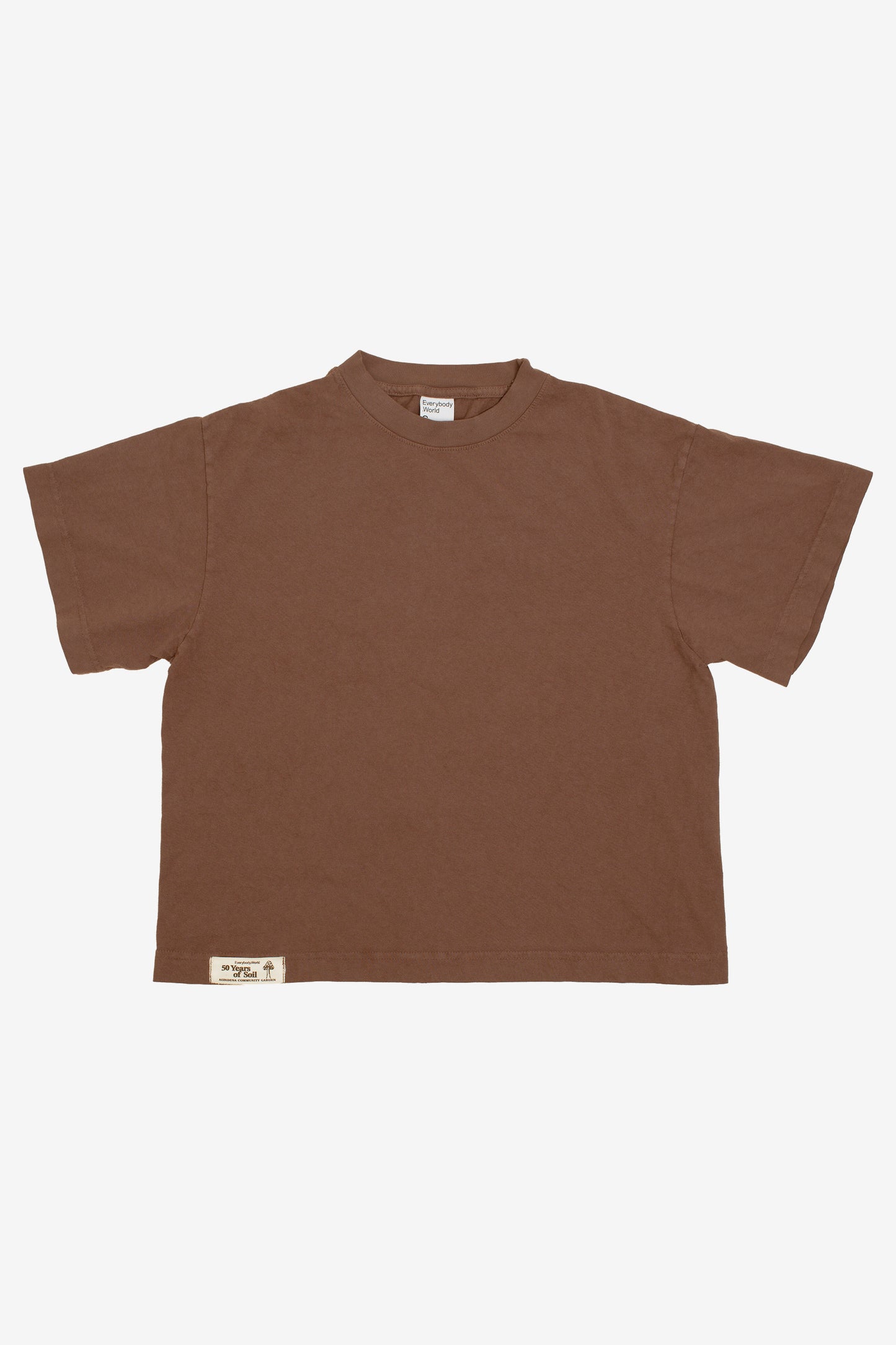 Flat lay showing the square-like boxy cut of the t-shirt.