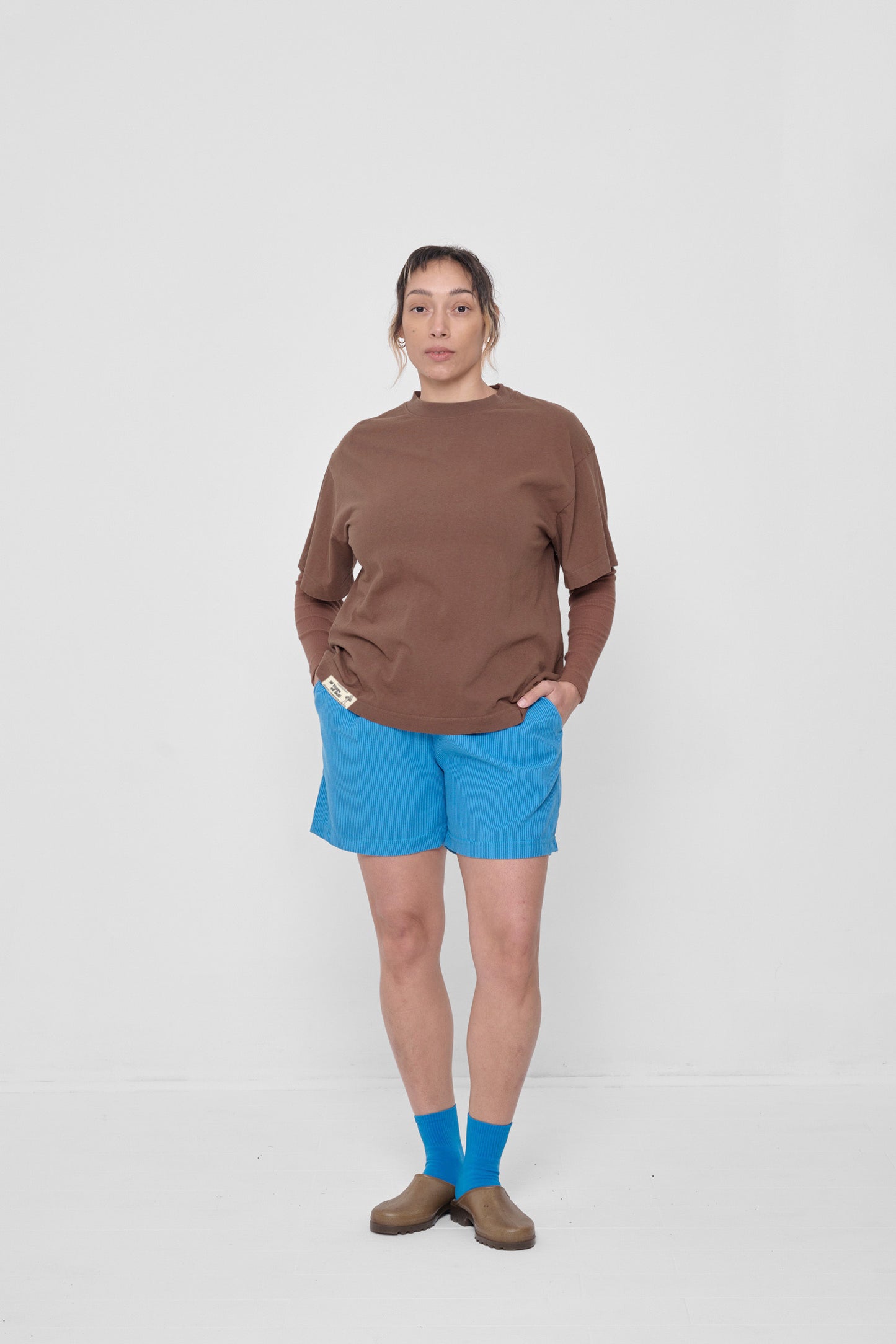 Layered over a Potting Soil Rib Long Sleeve and Malibu Stripe Poplin Everyday Shorts.