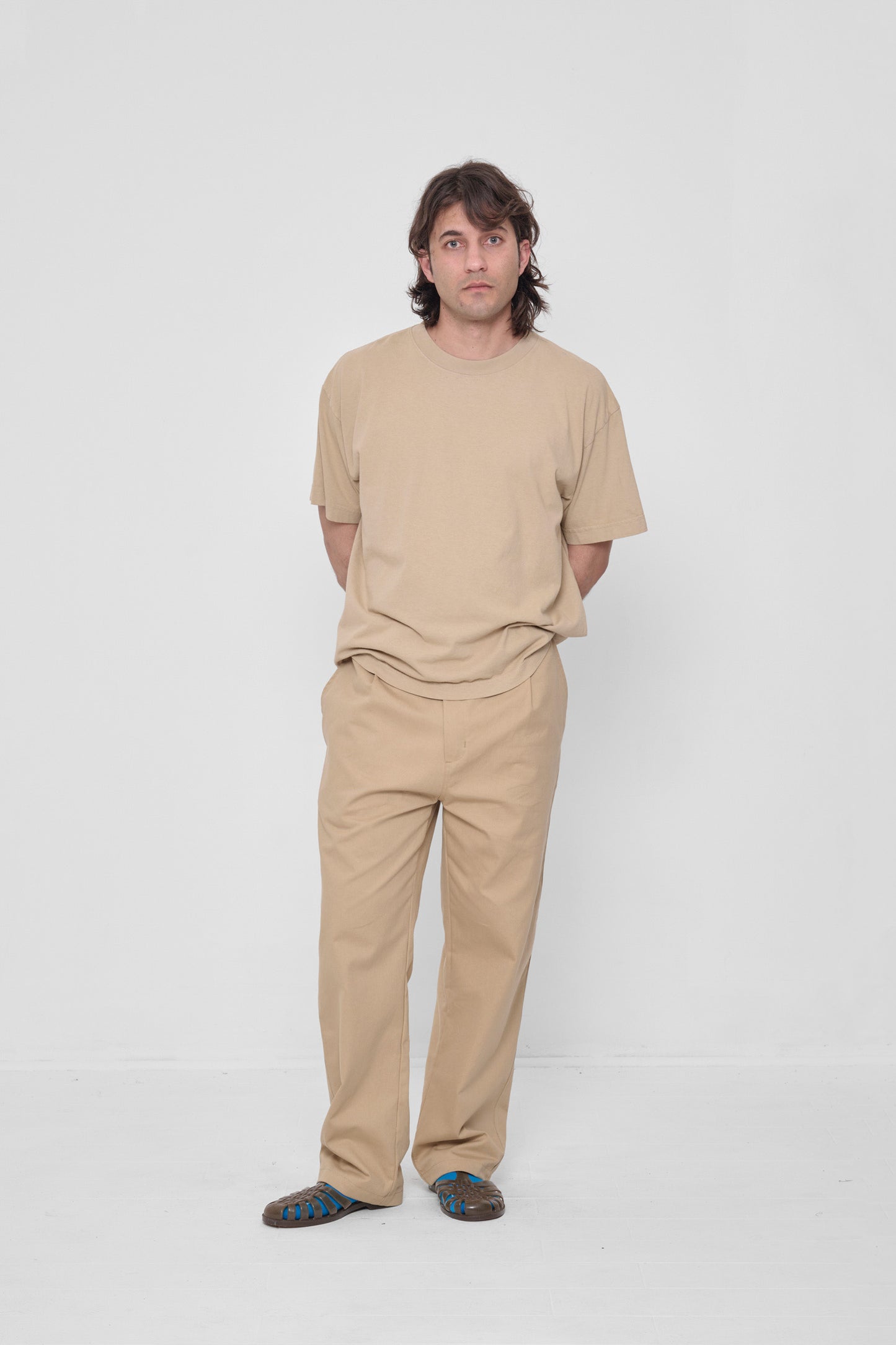 Styled with Sand Storm Life Uniform Pants and Plasticana Jelly Sandals. 