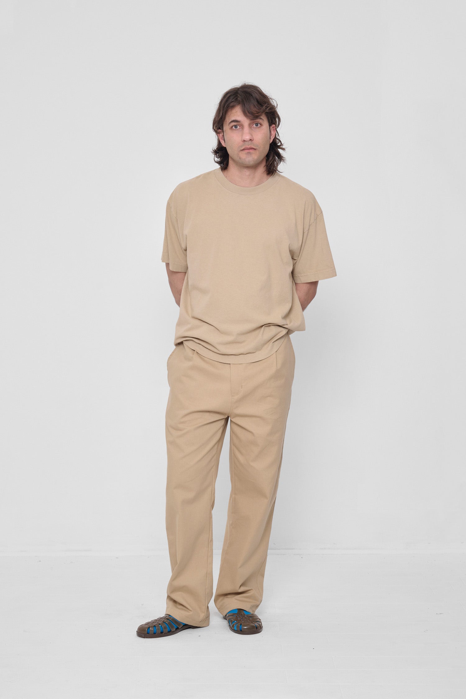 Styled with Sand Storm Life Uniform Pants and Plasticana Jelly Sandals. 