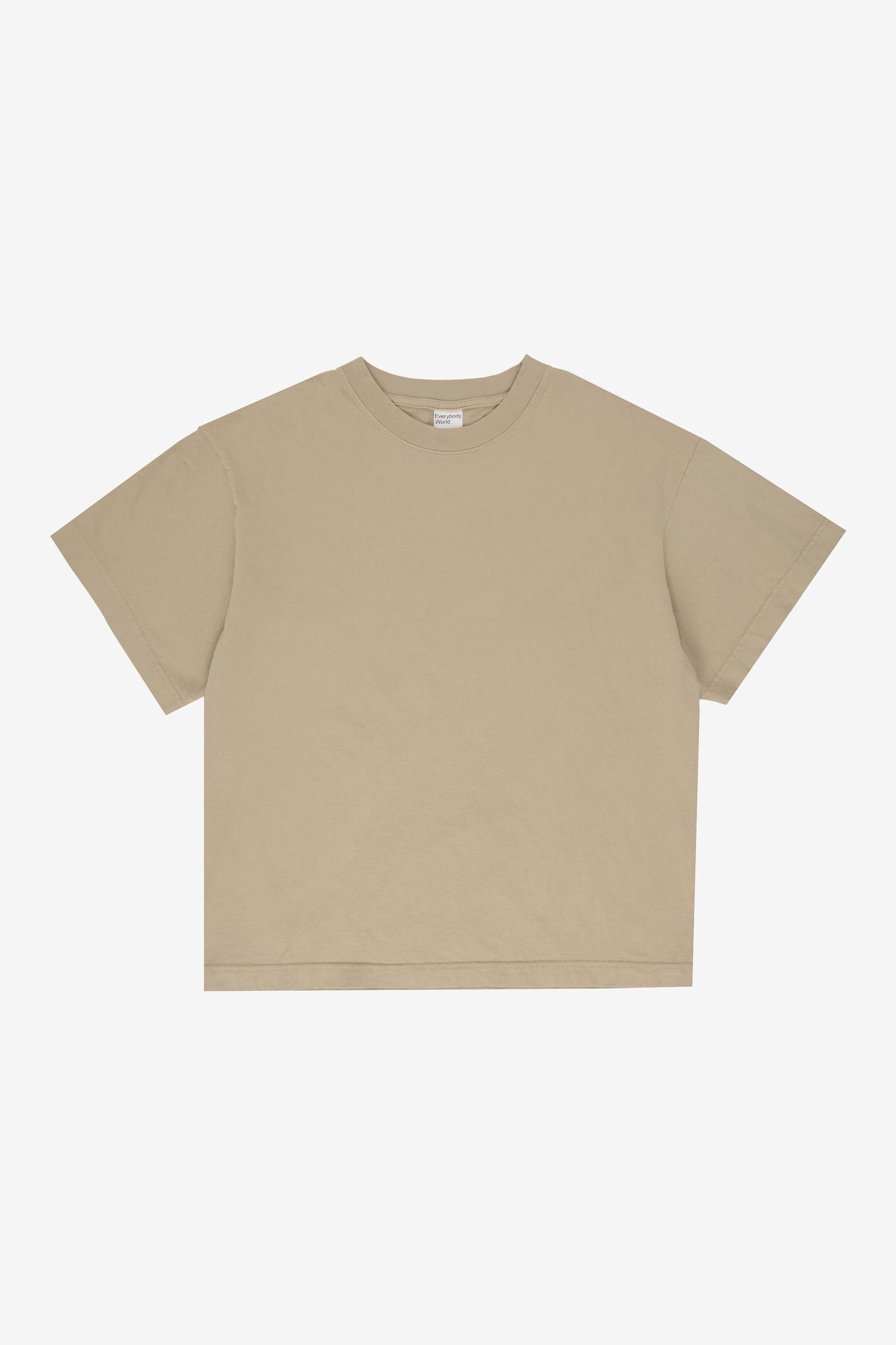 Flat lay showing the square-like boxy cut of the t-shirt.