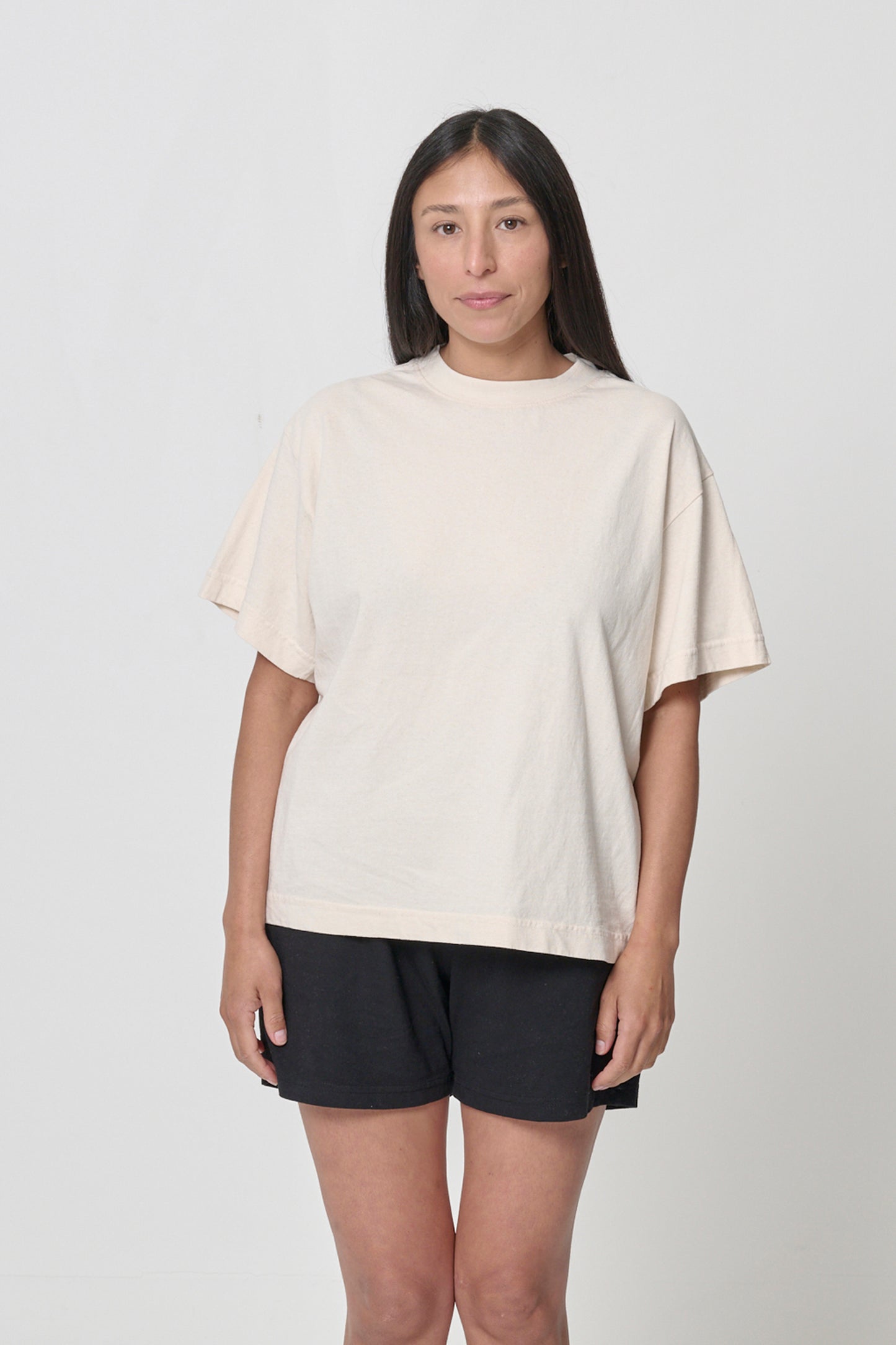 Front view of a 5'4" woman wearing Scour Boxier Trash Tee in size S. Bottom hem cropped to the hip.
