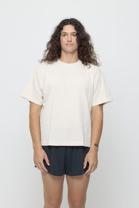 6' tall person wearing Scour (cream) Boxier Trash Tee in size M. Bottom hem at lower hip.