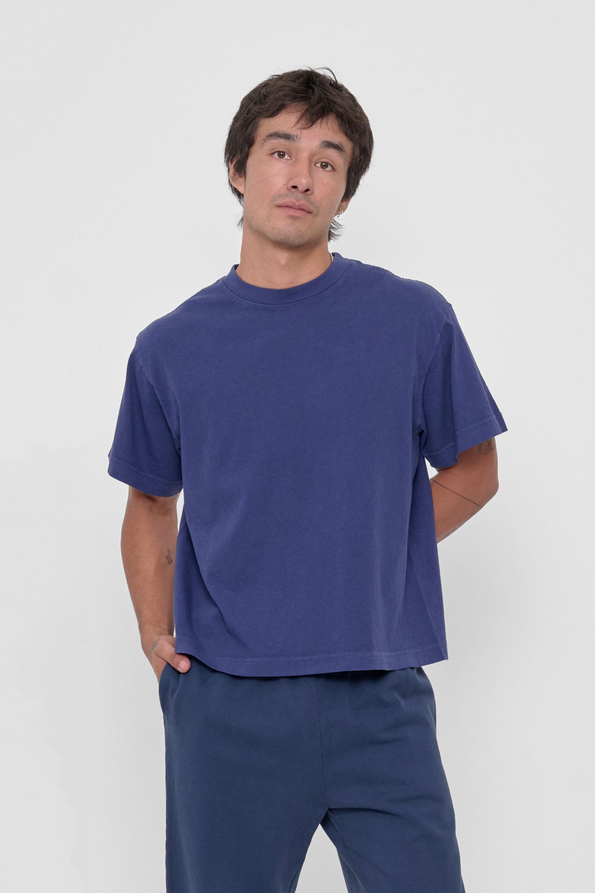 Boxier Trash Tee in Washed Navy – front view on model 