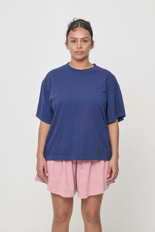 Front view of a 5'7" woman wearing Washed Navy (dark blue) Boxier Trash Tee in size M; bottom hem of shirt hits lower hip.