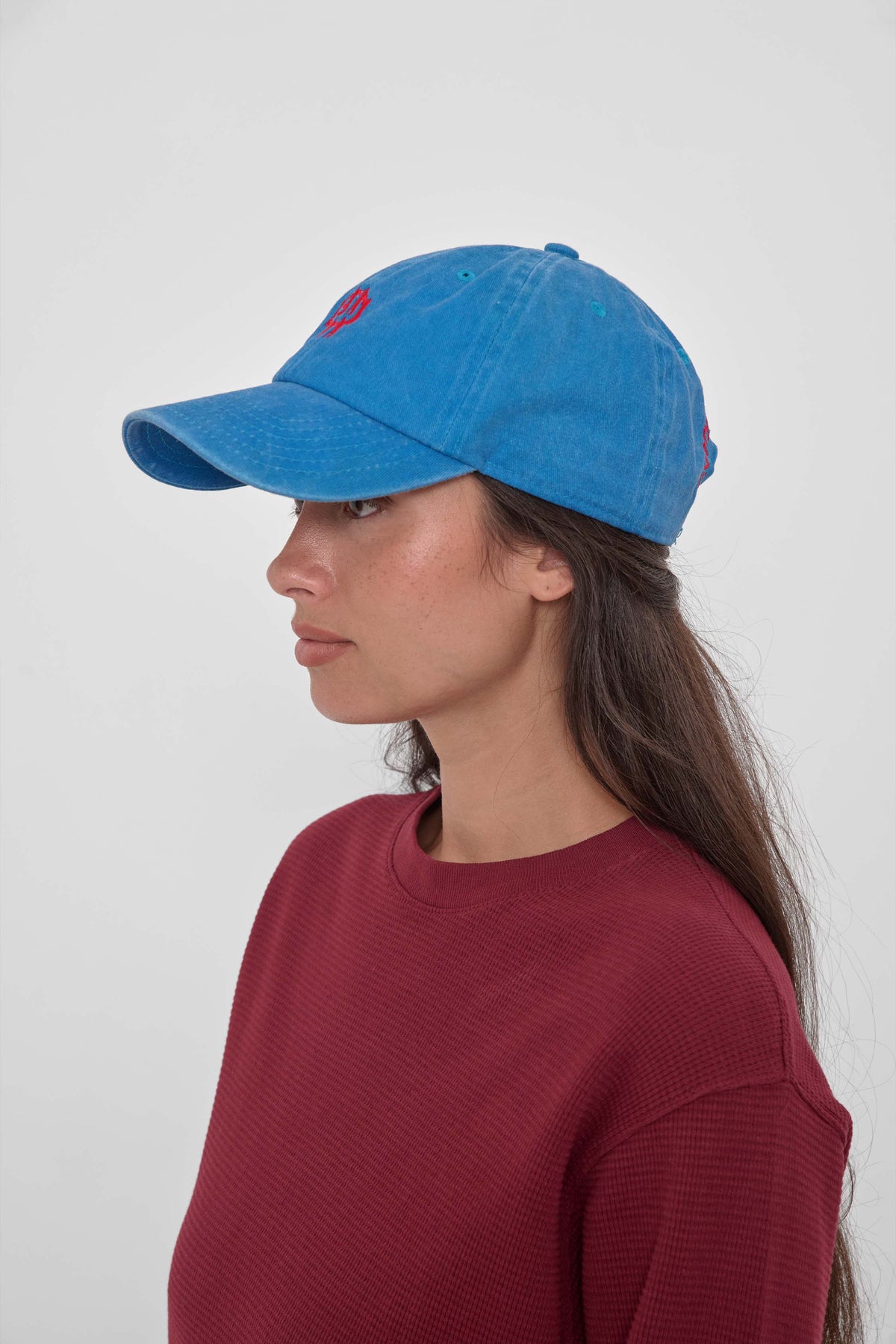 Bucky Logo Cap in Malibu - side view of model