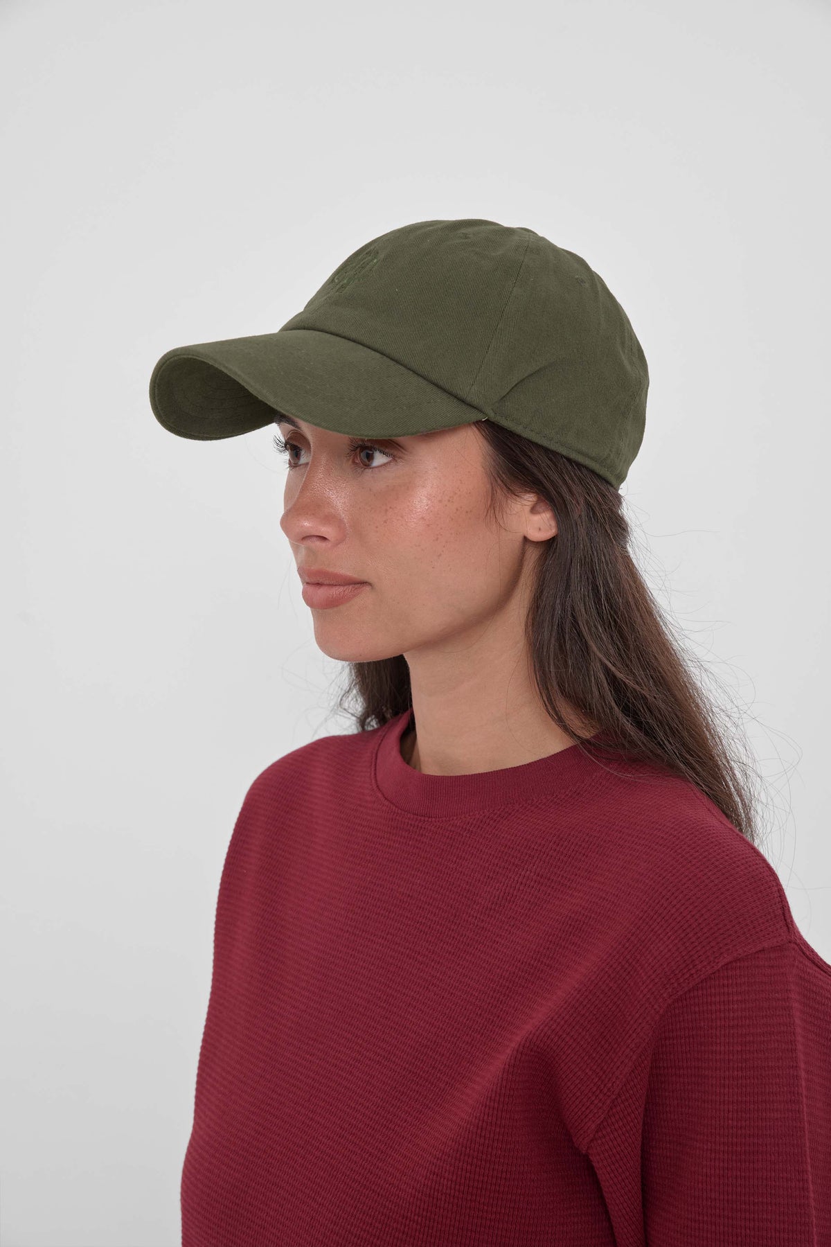 Bucky Logo Cap in Olive - side view of model