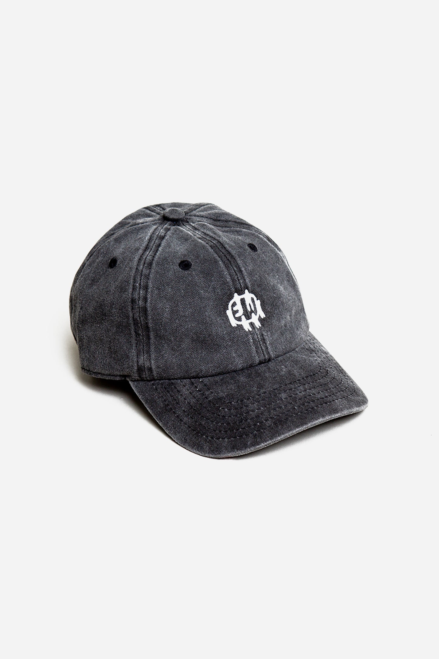 Bucky Logo Cap in Slate grey with a white logo, on a white background. Details show eyelets on hat panels and stitching on bill.