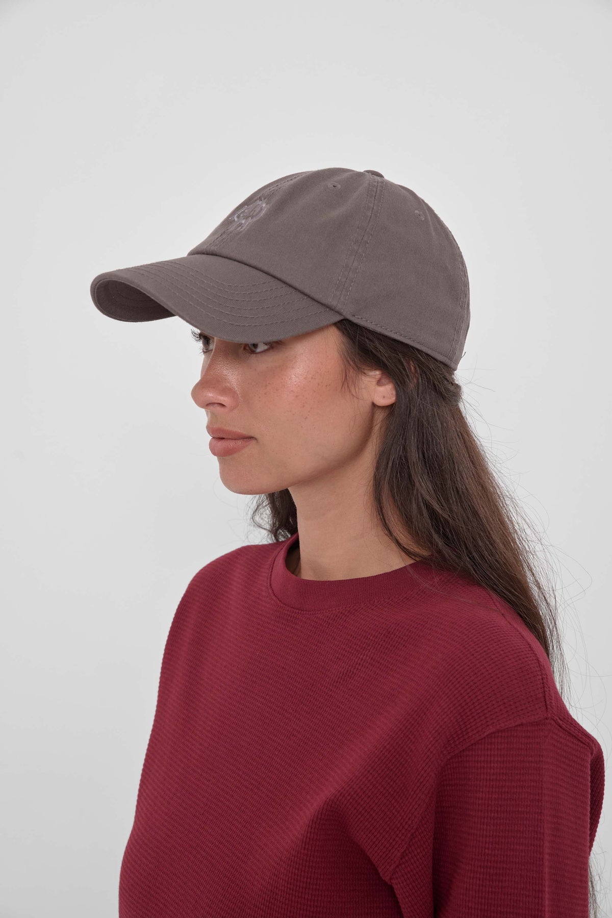 Bucky Logo Cap in Stone - side view of model