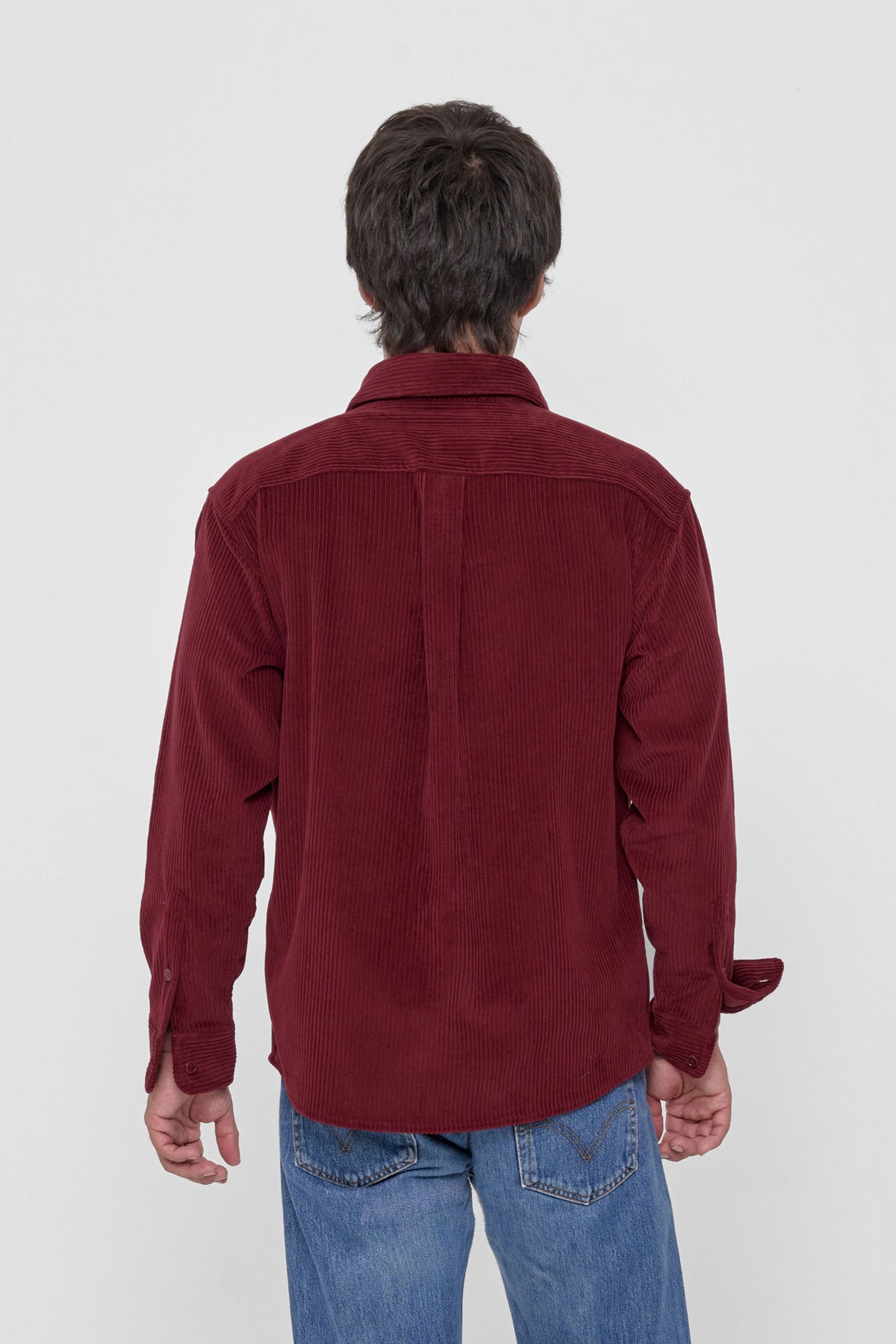 Cord Button-Up Shirt in Garnet – back view on model