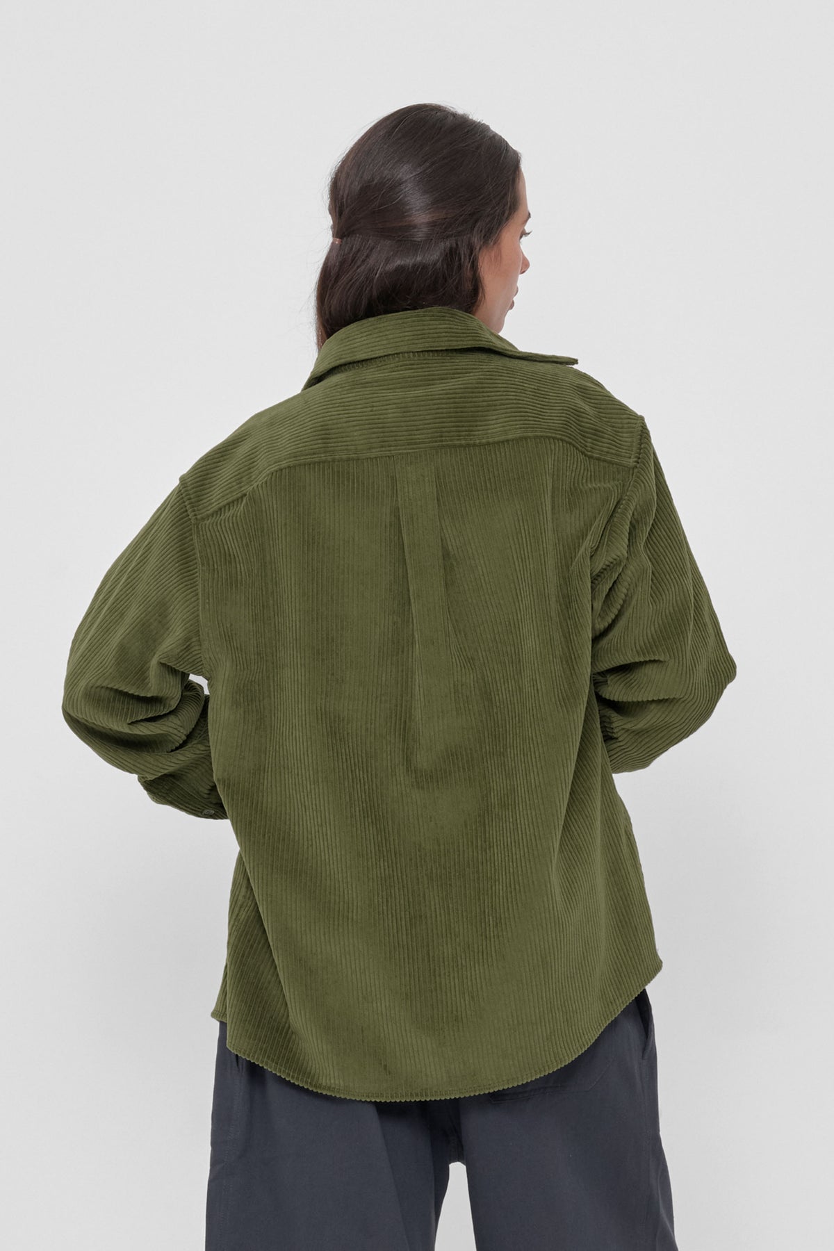 Cord Button-Up Shirt in Olive – back view on model