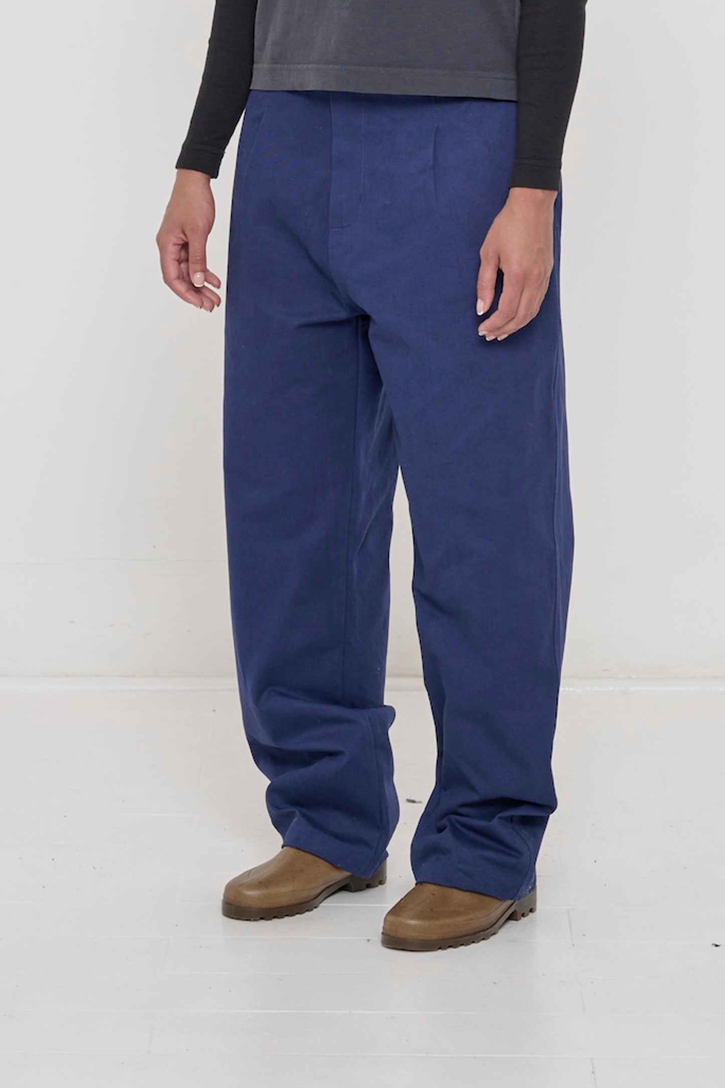 Model facing 45-degrees, in Washed Navy Cotton Twill Life Uniform Pants, sized up and slouchy. Shows inseam and outseam.