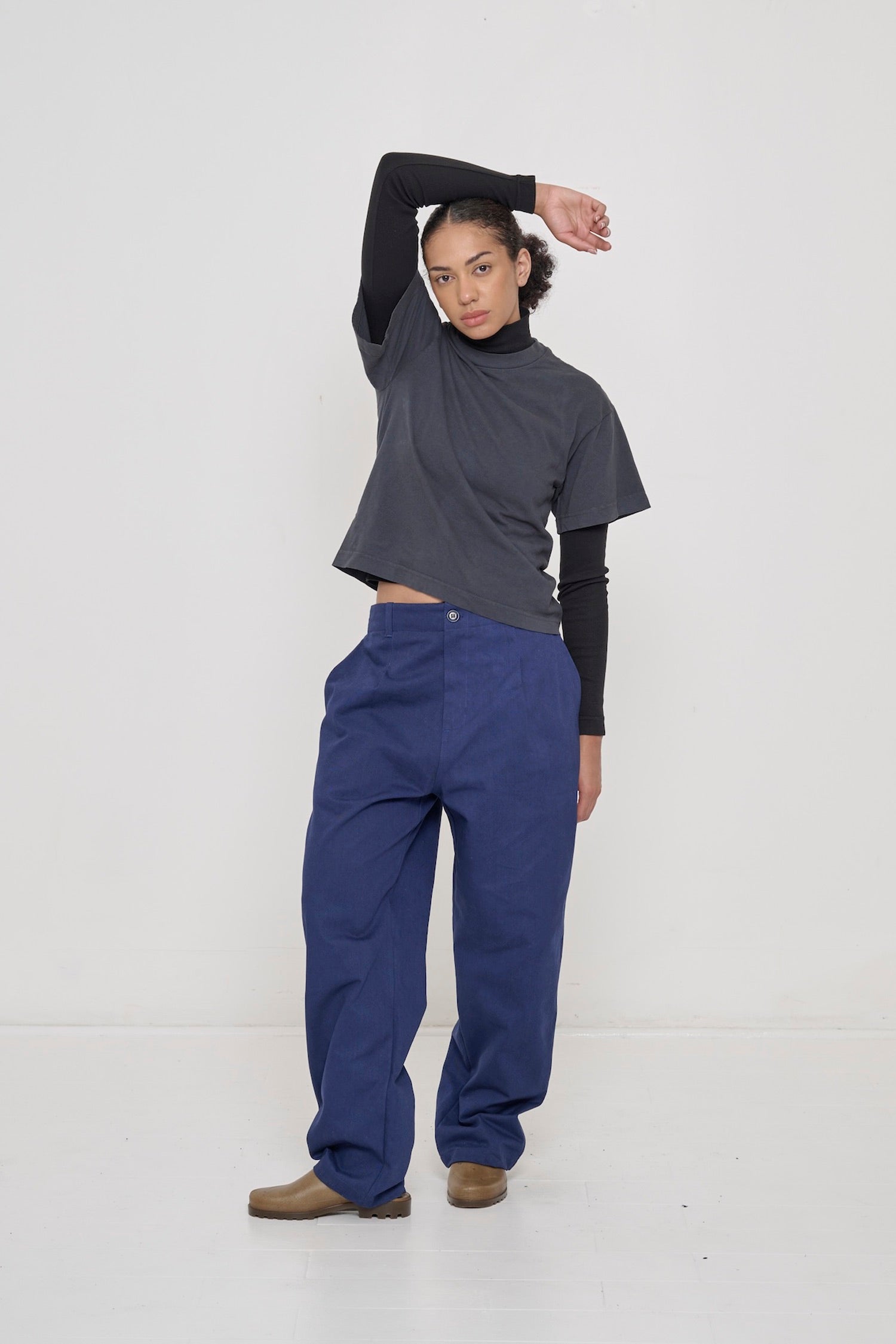 5'8" model in size M Washed Navy Cotton Twill Life Uniform Pants, worn oversized for a relaxed fit.
