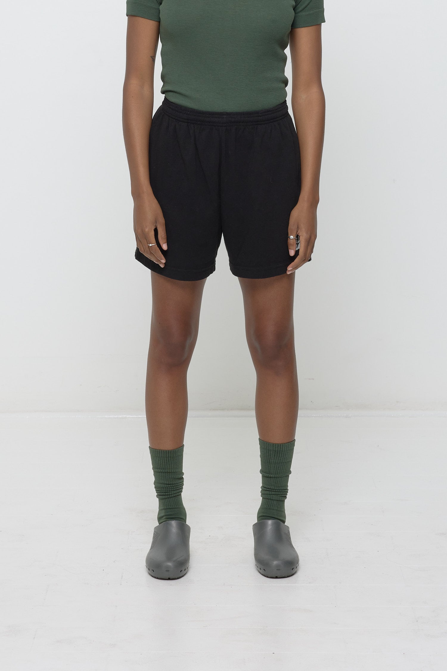 5'3" person in size S Black Everyday Shorts shows relaxed fit.