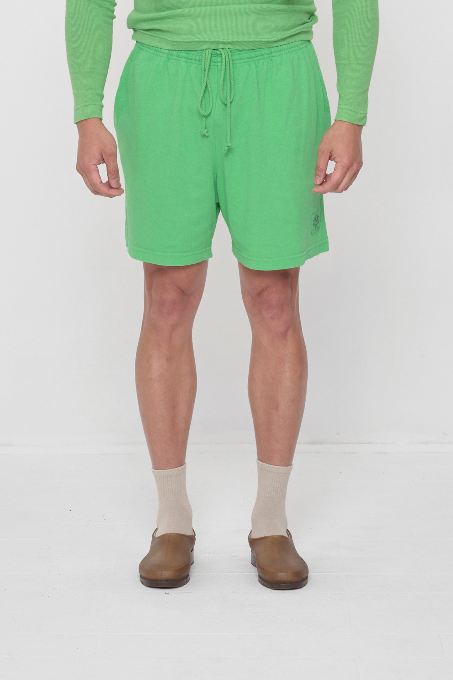 5'11" man wearing size XL Nice Grass Everyday Shorts. Leg hem hits just above his knee. 
