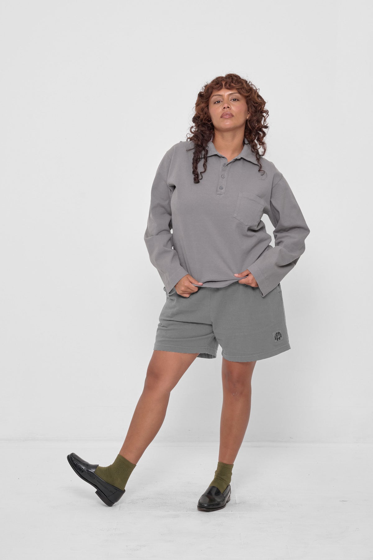 Everyday Shorts in Stone - styled with matching Rugby Trash Polo, Olive Squishy Socks, and loafers