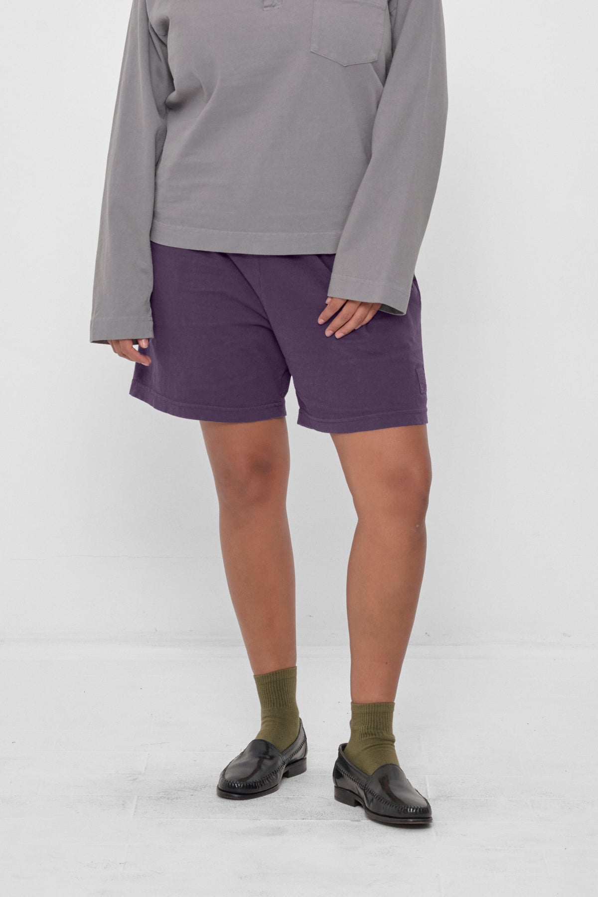Everyday Shorts in Washed Mulberry - front view, model's hands to their side