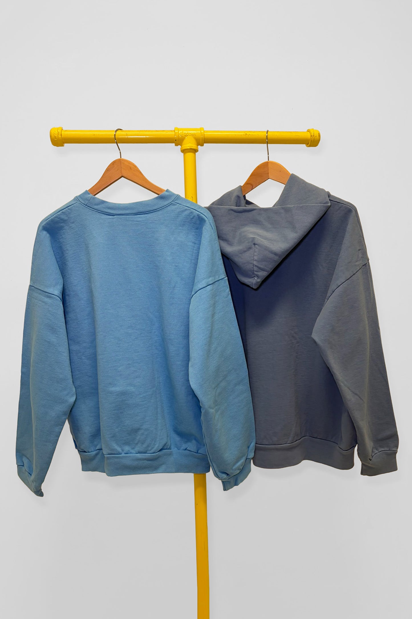 L Crewneck & Trash Hoodie, back view