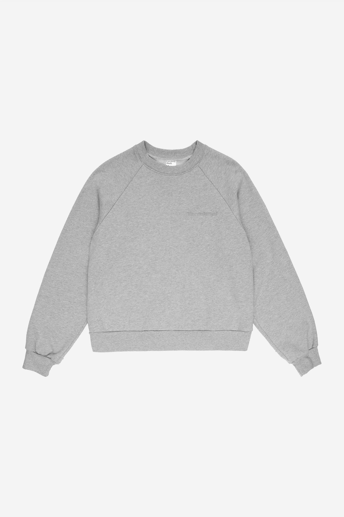 Heather grey raglan sweatshirt showing diagonal sleeve seams running from neckline to underarm