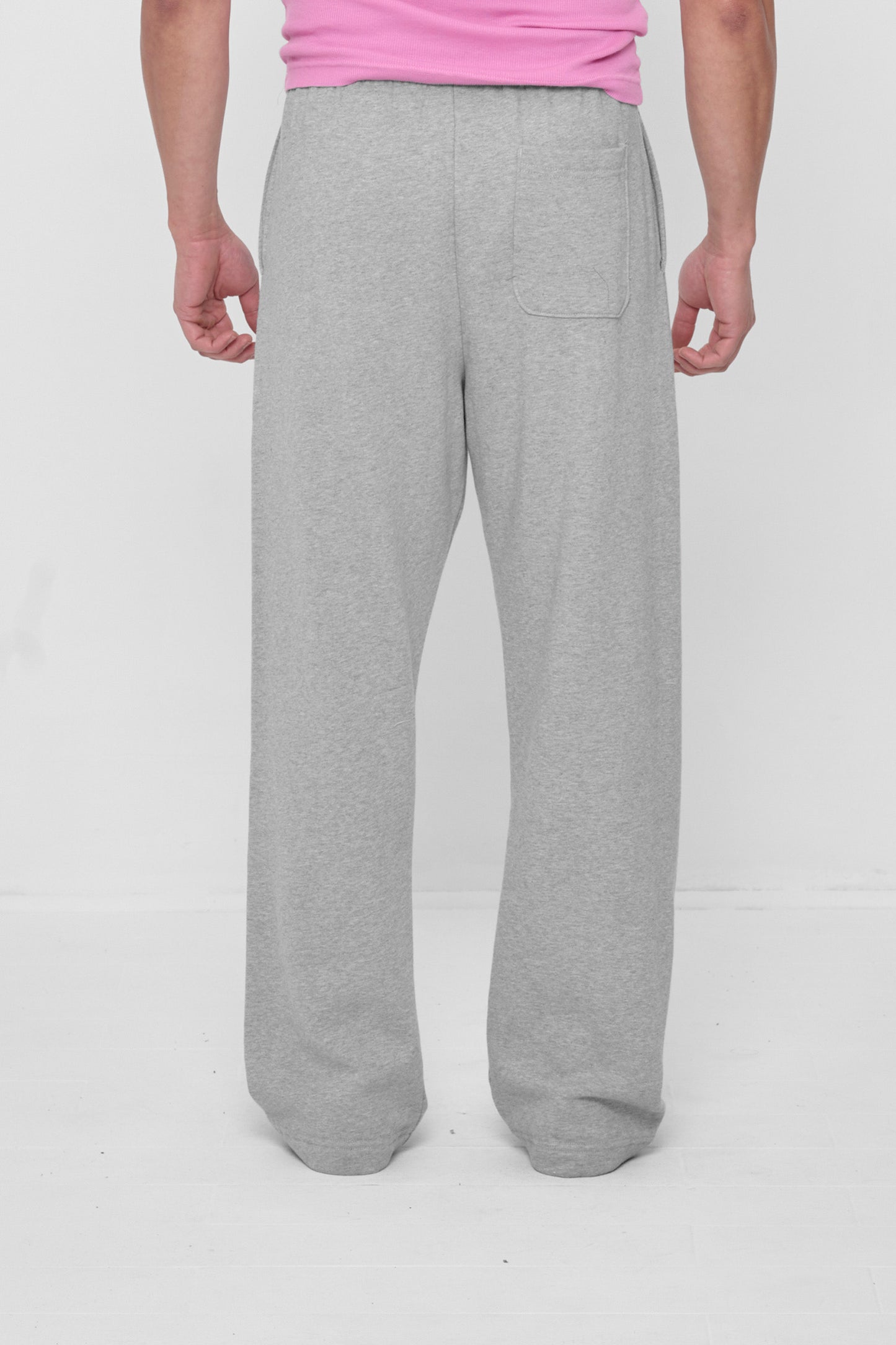 Back view shows right back pocket and relaxed leg fit.