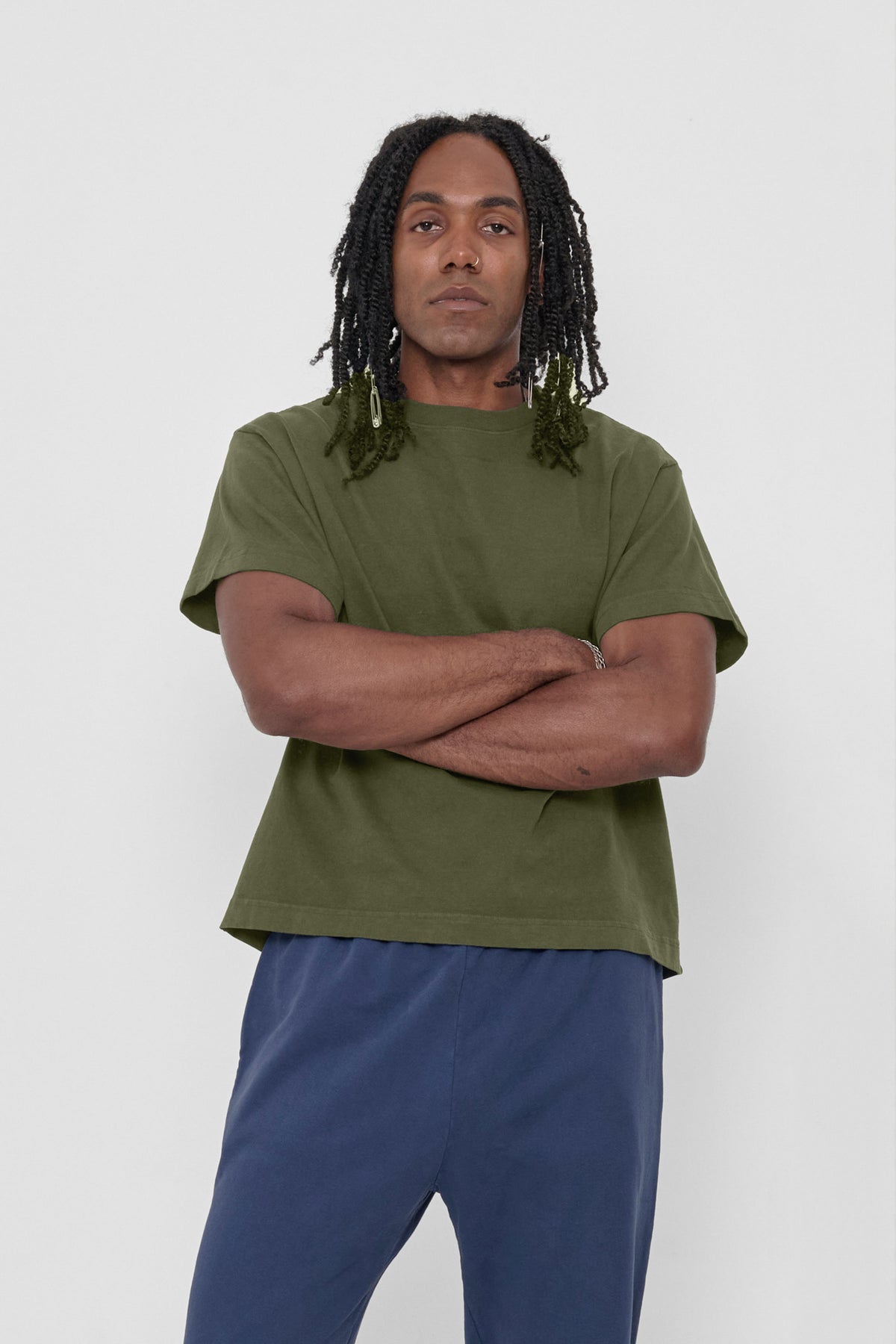 Heavyweight Boxier Trash Tee in Olive – front view on model