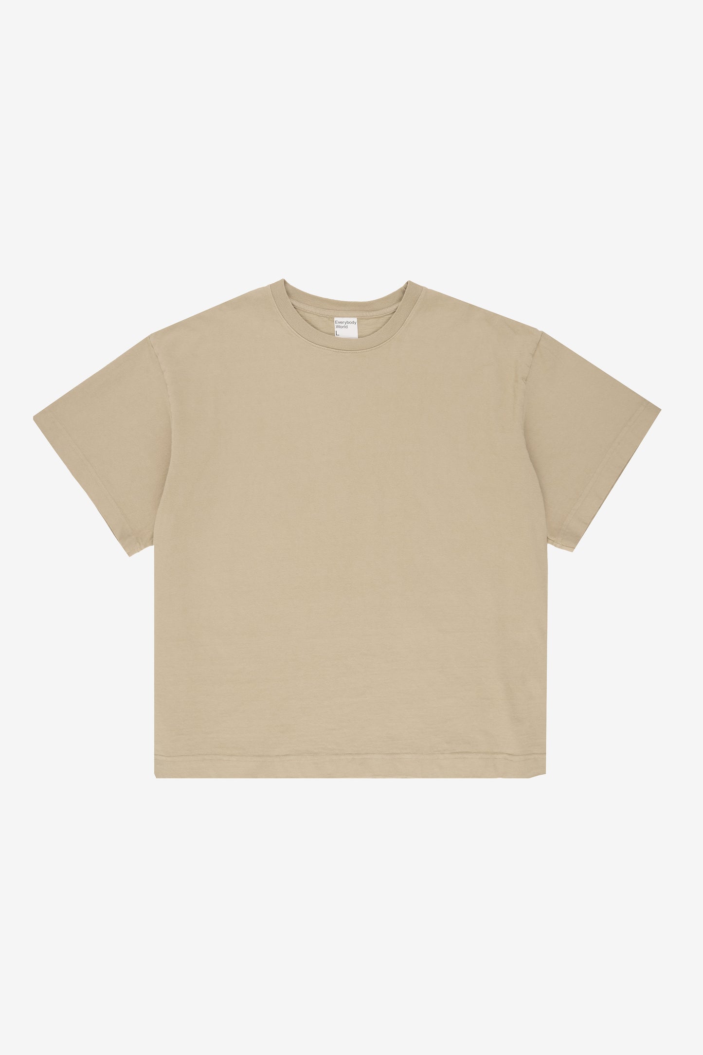 Flat lay showing the straight boxy cut of the T-shirt.