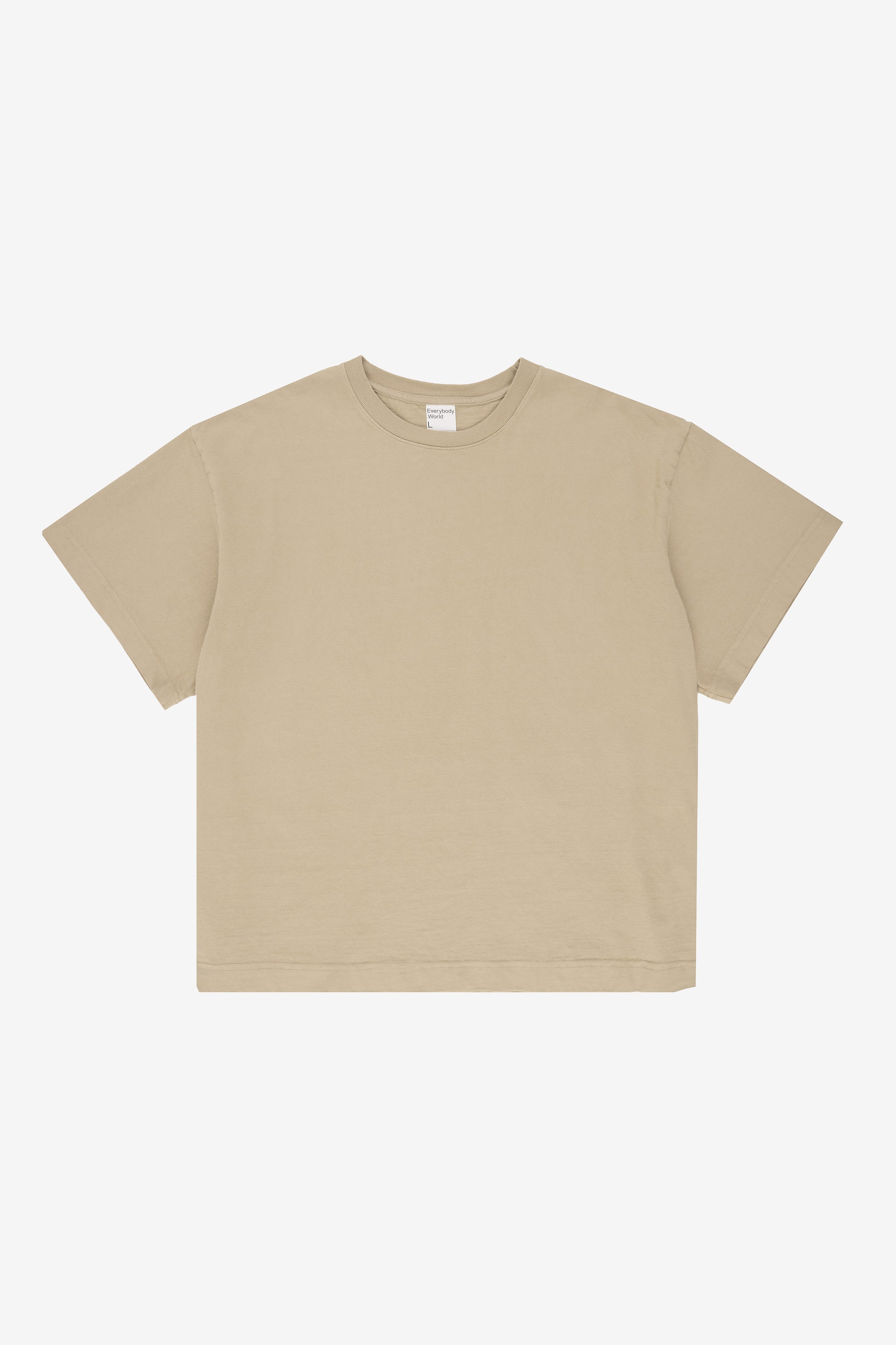 Flat lay showing the straight boxy cut of the T-shirt.