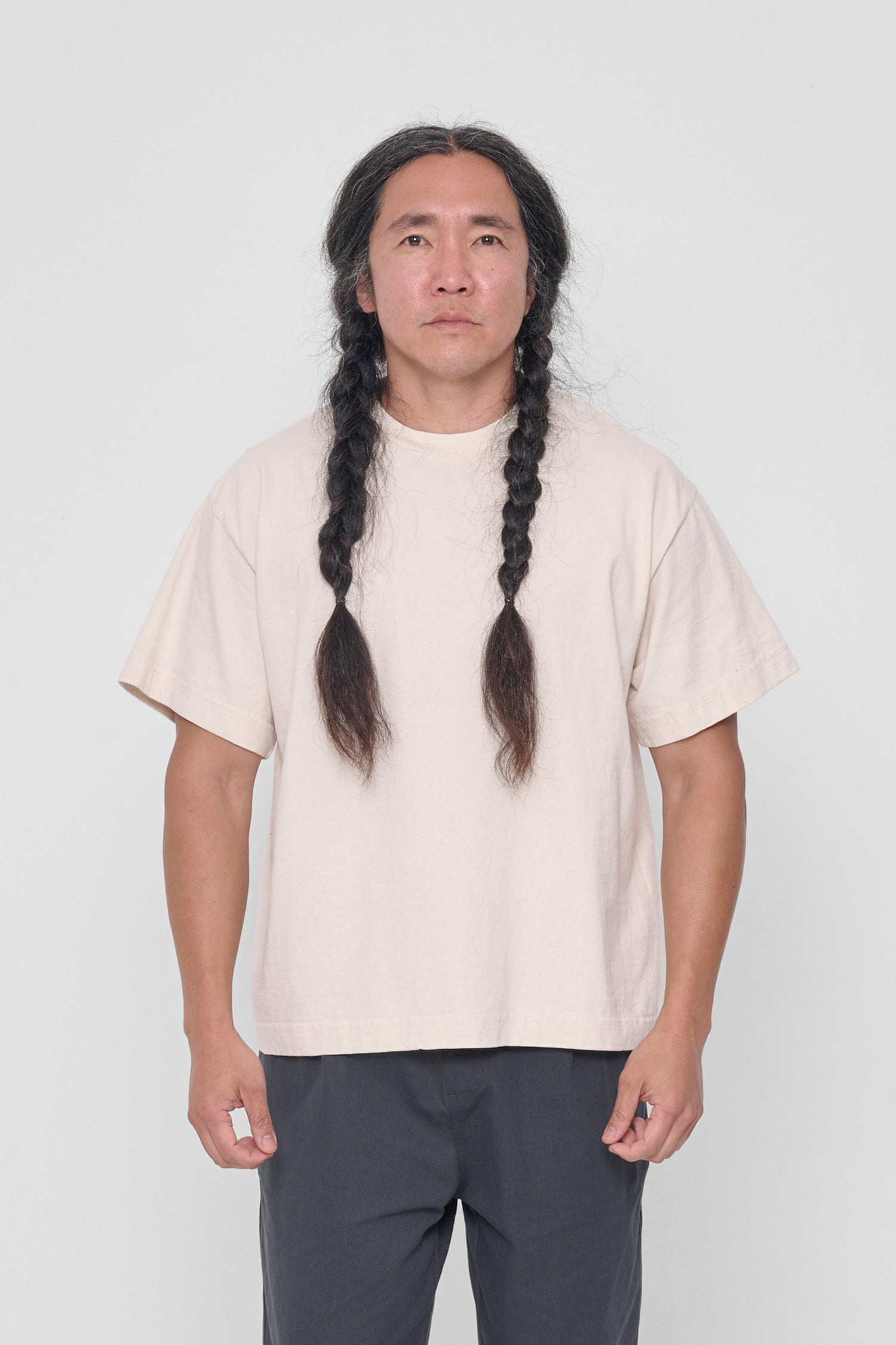 5'11" man wearing size L Scour Heavyweight Boxier Trash Tee. Hem is at his middle hip.