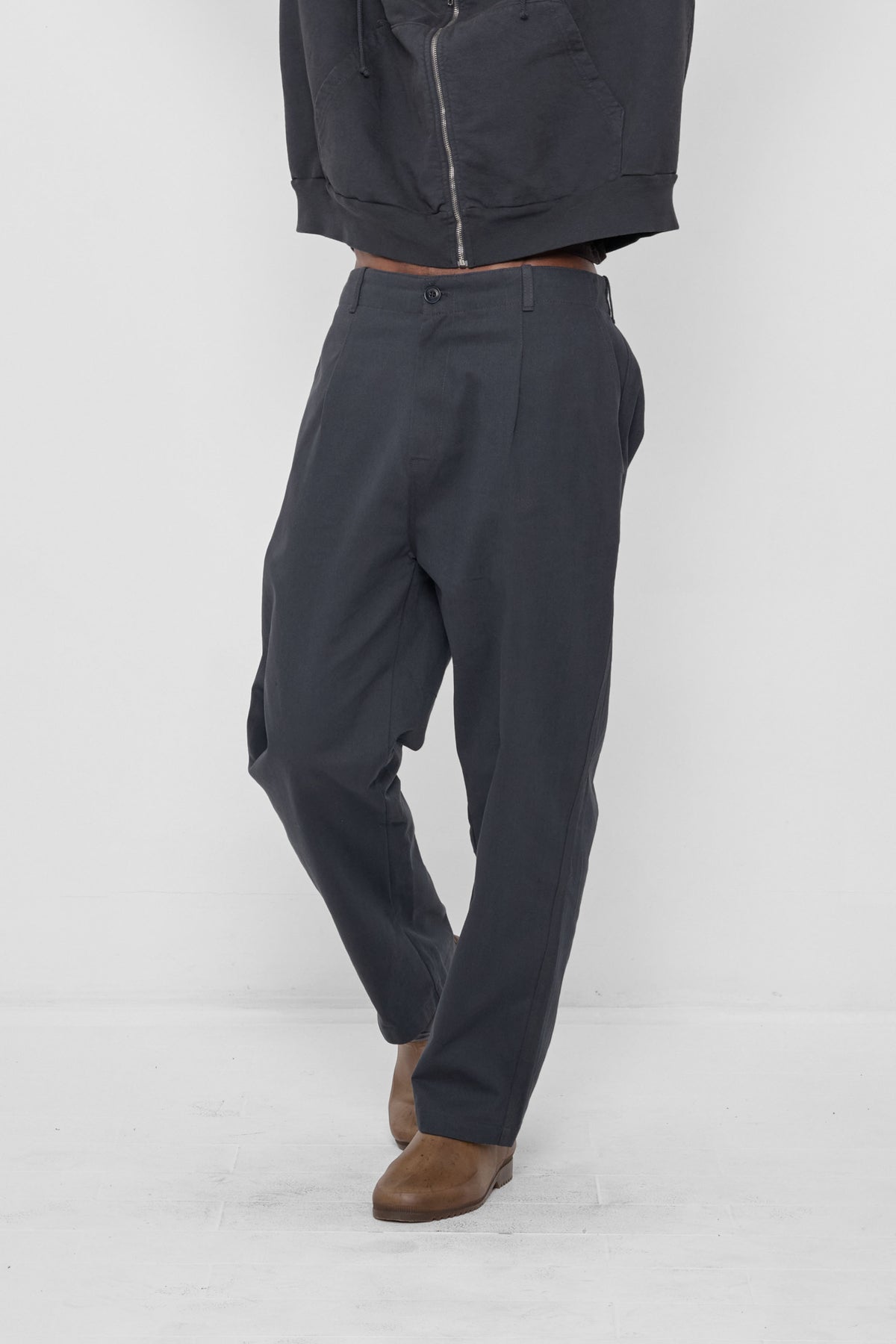 Life Uniform Pants in Slate – 3/4 front view on model