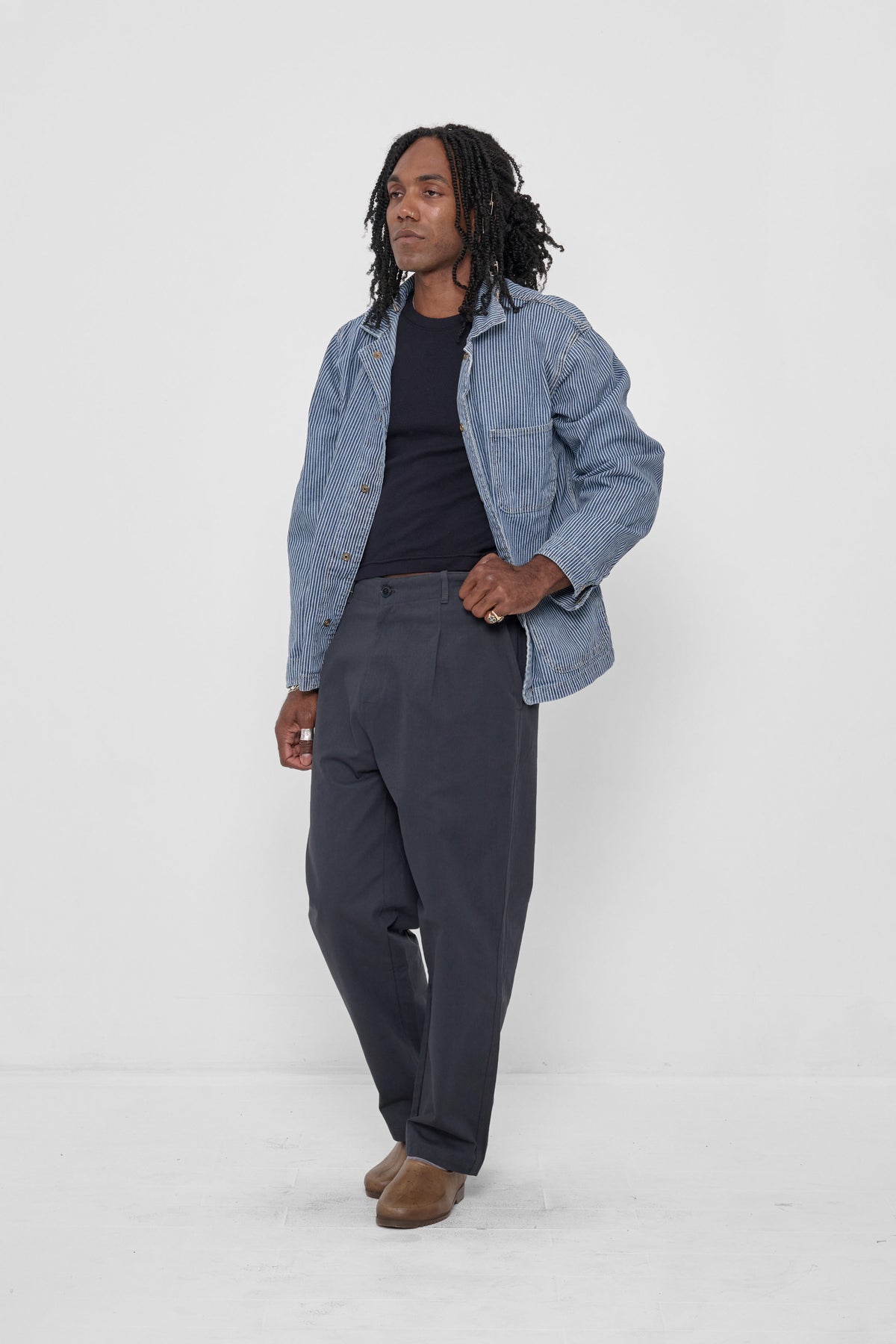 Life Uniform Pants in Slate – 3/4 front view on model