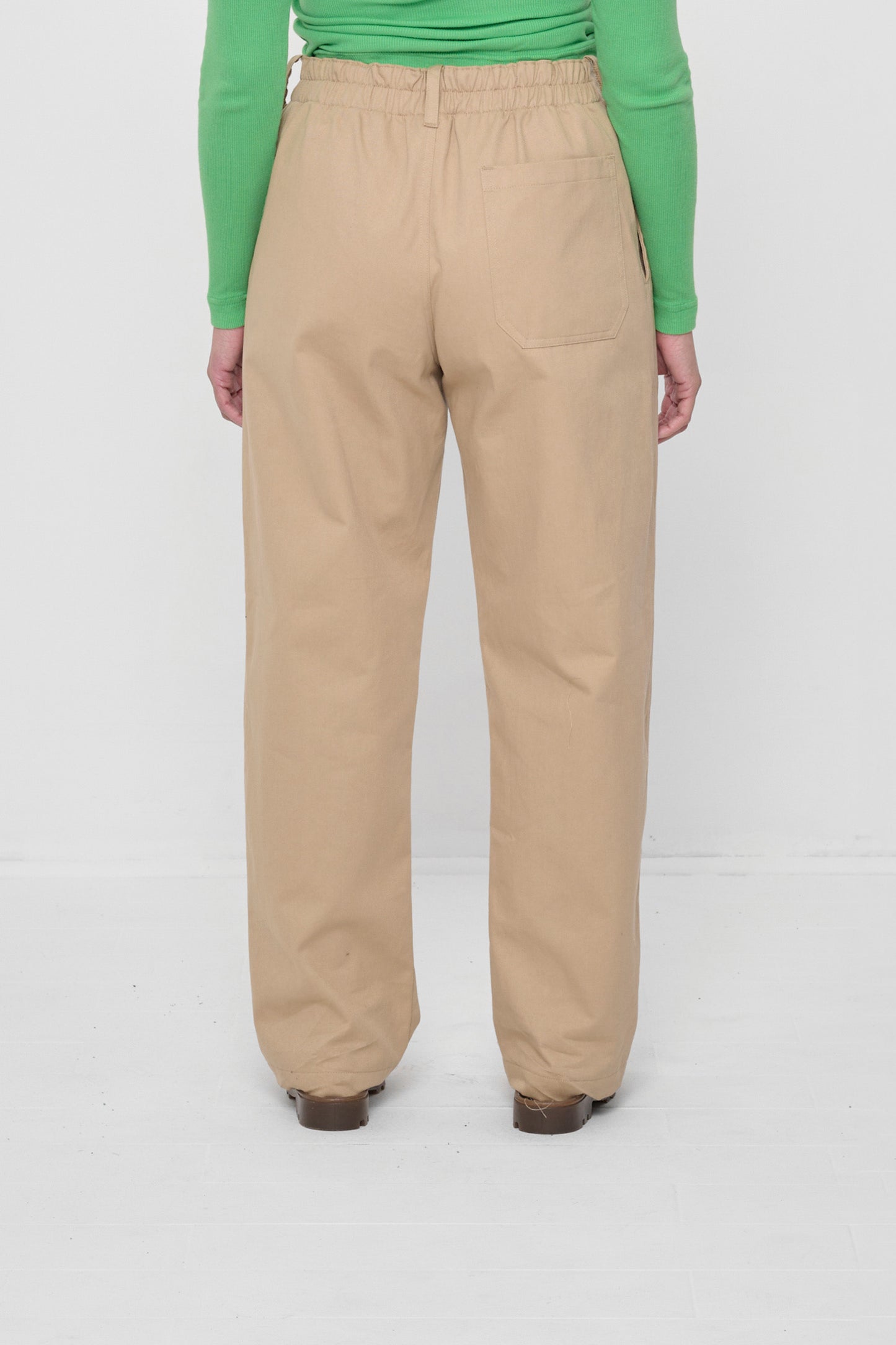 Back view showing the relaxed, straight leg fit and back pocket. 