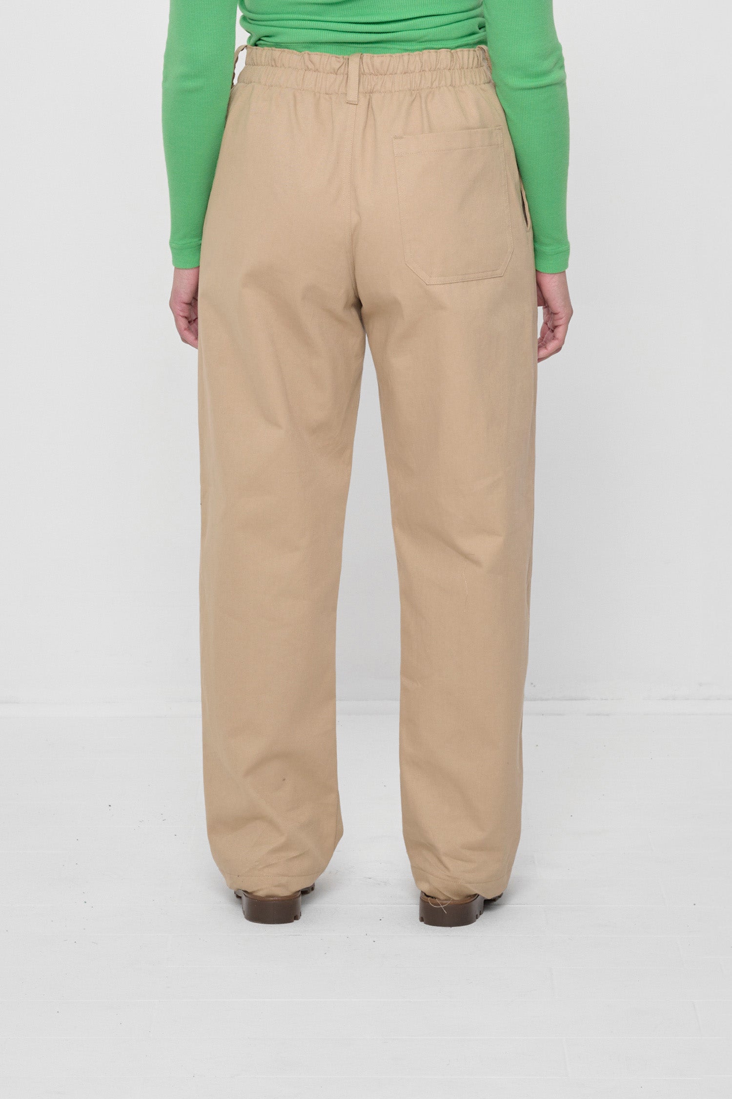 Back view showing the relaxed, straight leg fit and back pocket. 