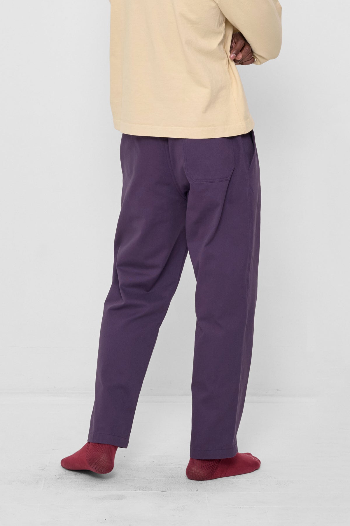 Life Uniform Pants in Washed Mulberry – back view on model