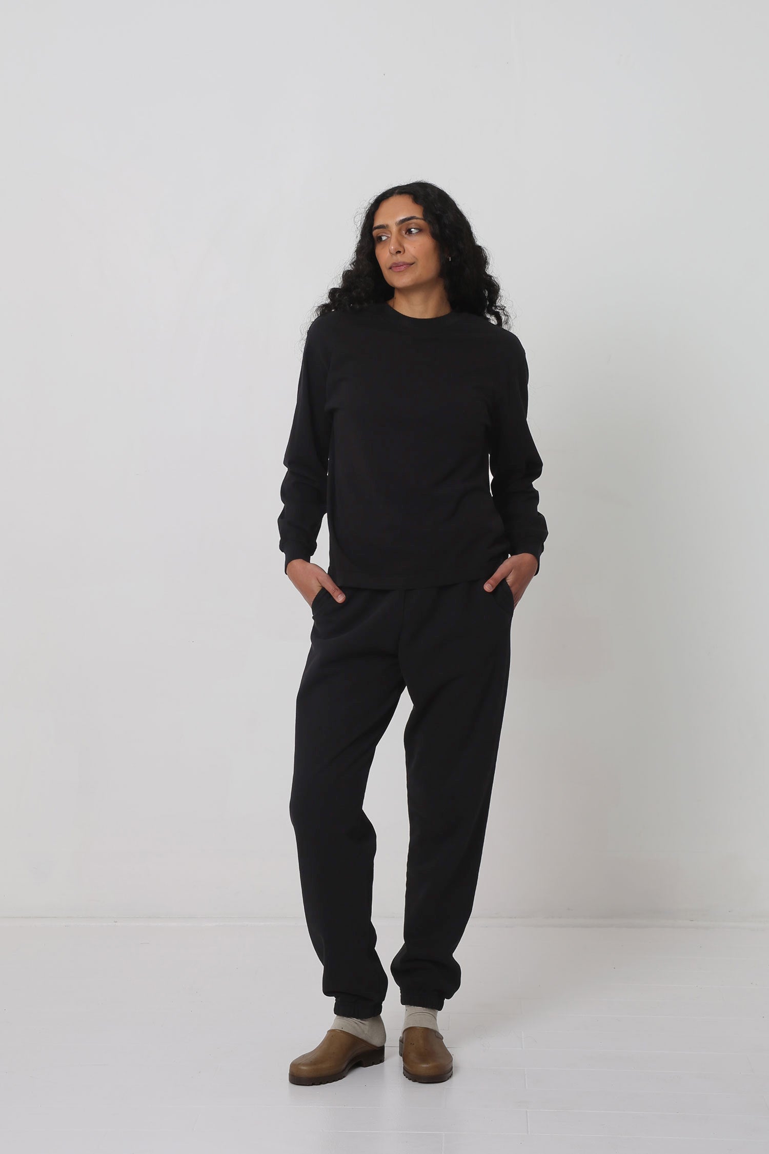 Styled with Black Trash Sweatpants, Oat Squishy Socks and Plasticana Opana Mules.