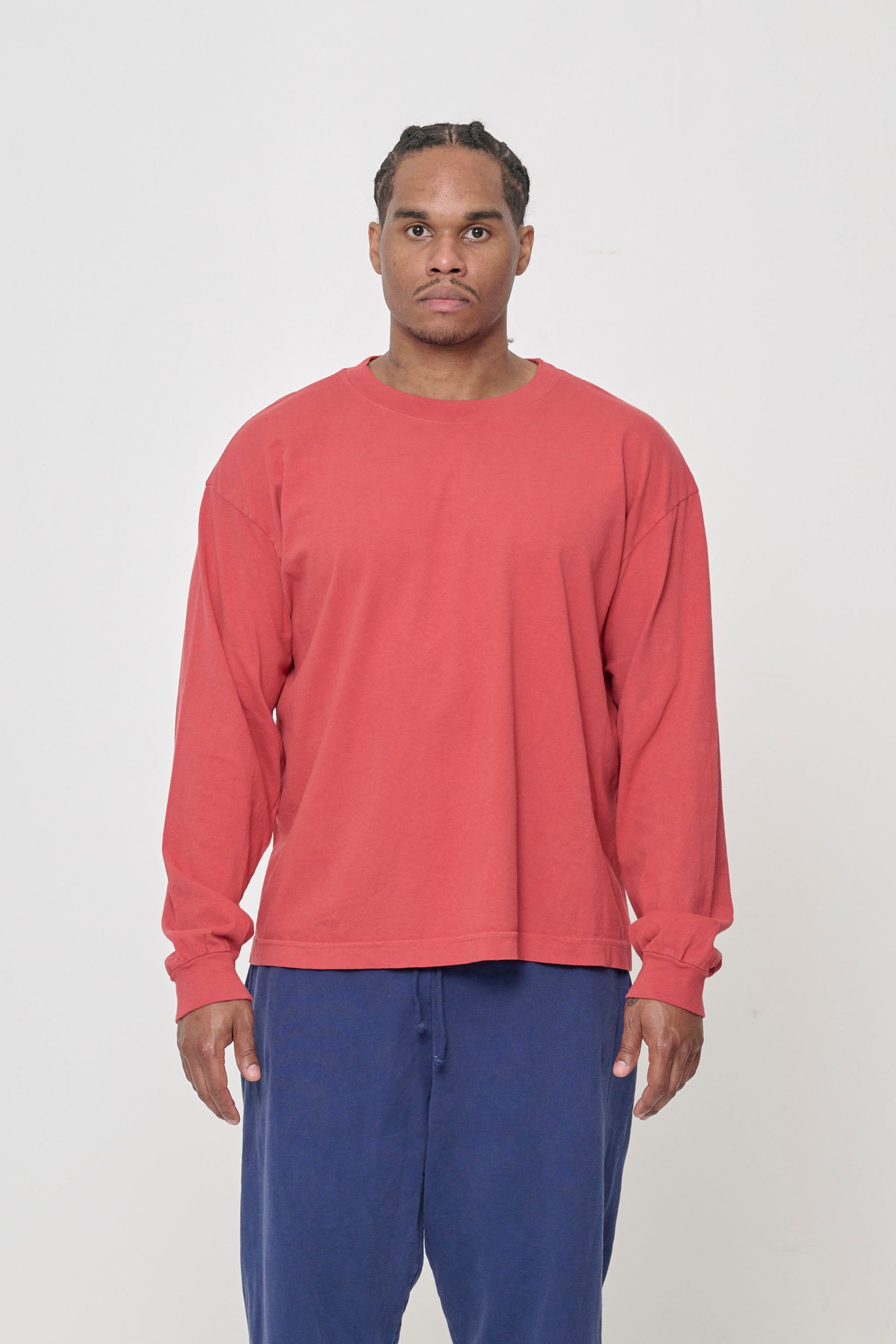 A 6' person wearing Cedar Long Sleeve Boxier Trash Tee in size L. Shirt hem hits the middle of the hip. 