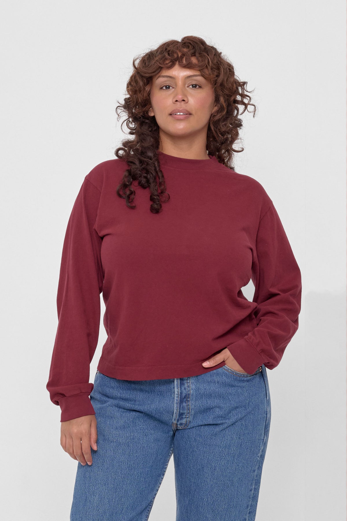 Long Sleeve Boxier Trash Tee in Garnet – front view on model