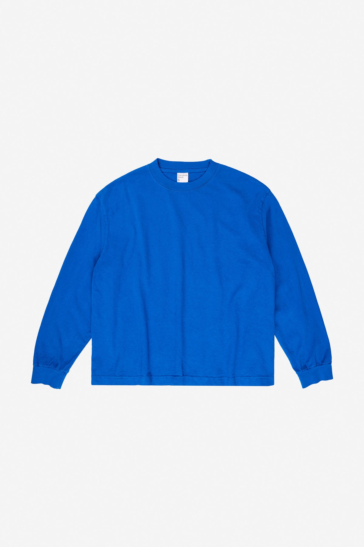 Long Sleeve Boxier Trash Tee in Lapis – flat lay, no model