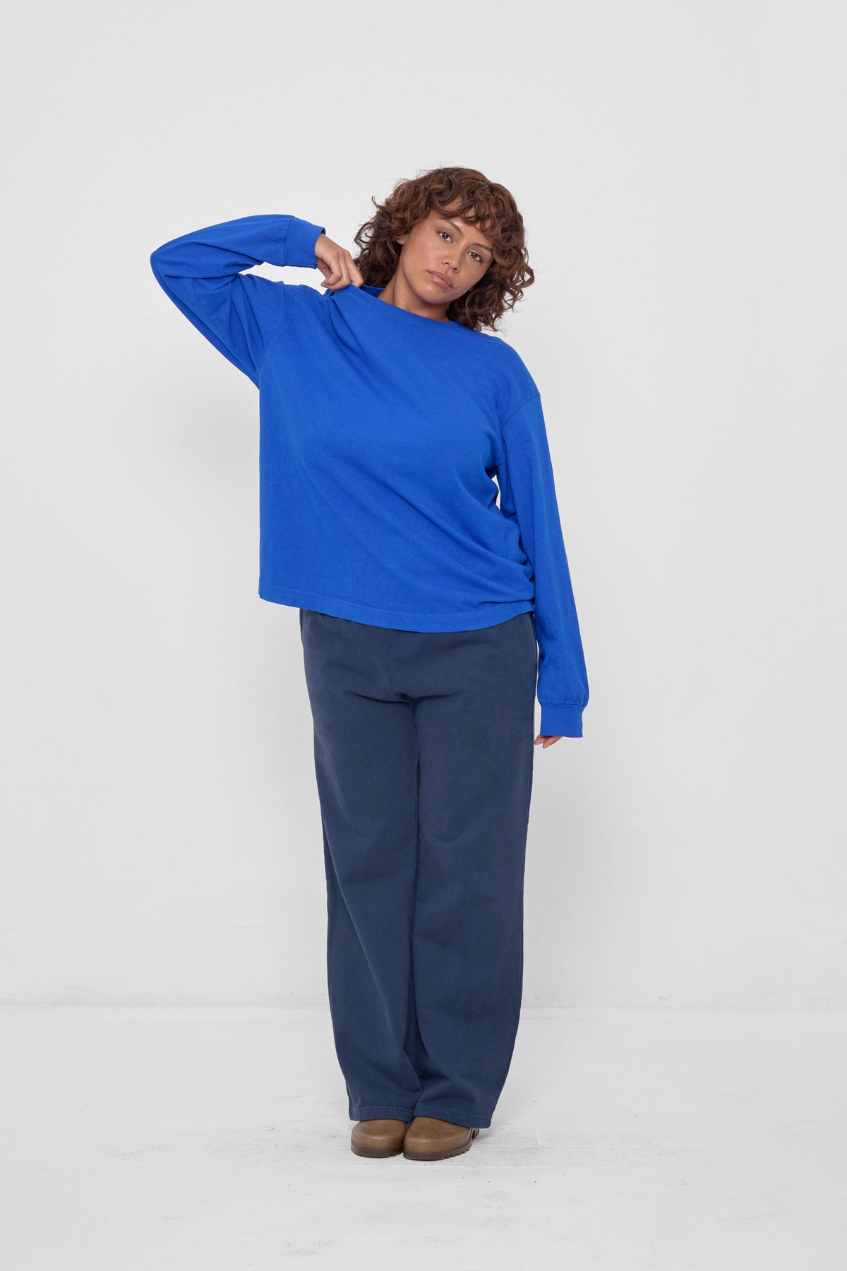 Long Sleeve Boxier Trash Tee in Lapis – styled with Washed Navy Trash Fleece Apartment Pants and Plasticana Gardana Clogs
