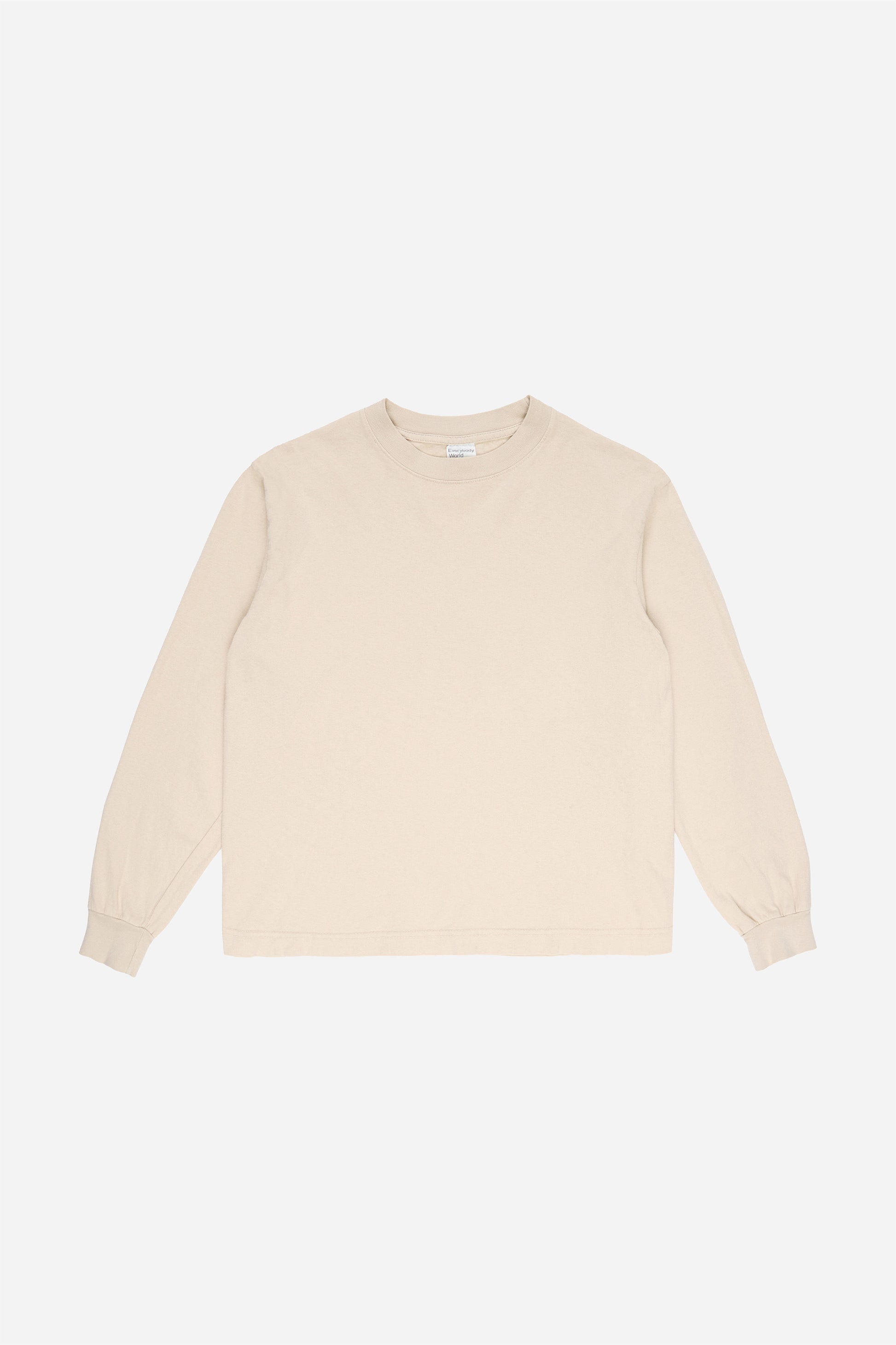 Flat lay of Oat Long Sleeve Boxier Trash Tee showing the cropped boxy silhouette.