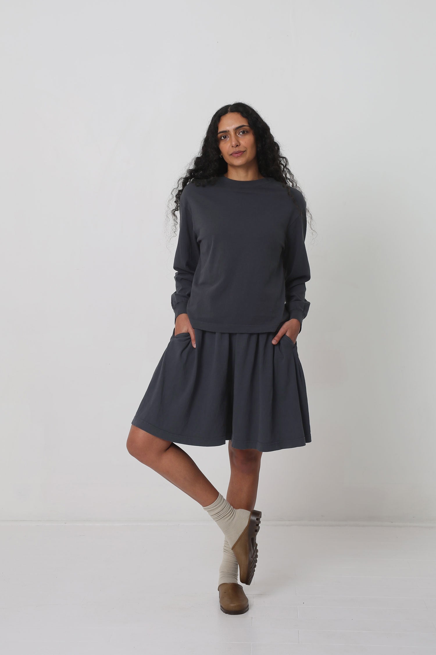 Styled with Slate Long Tubular Shorts, Oat Squishy Socks and Plasticana Opana Mules.