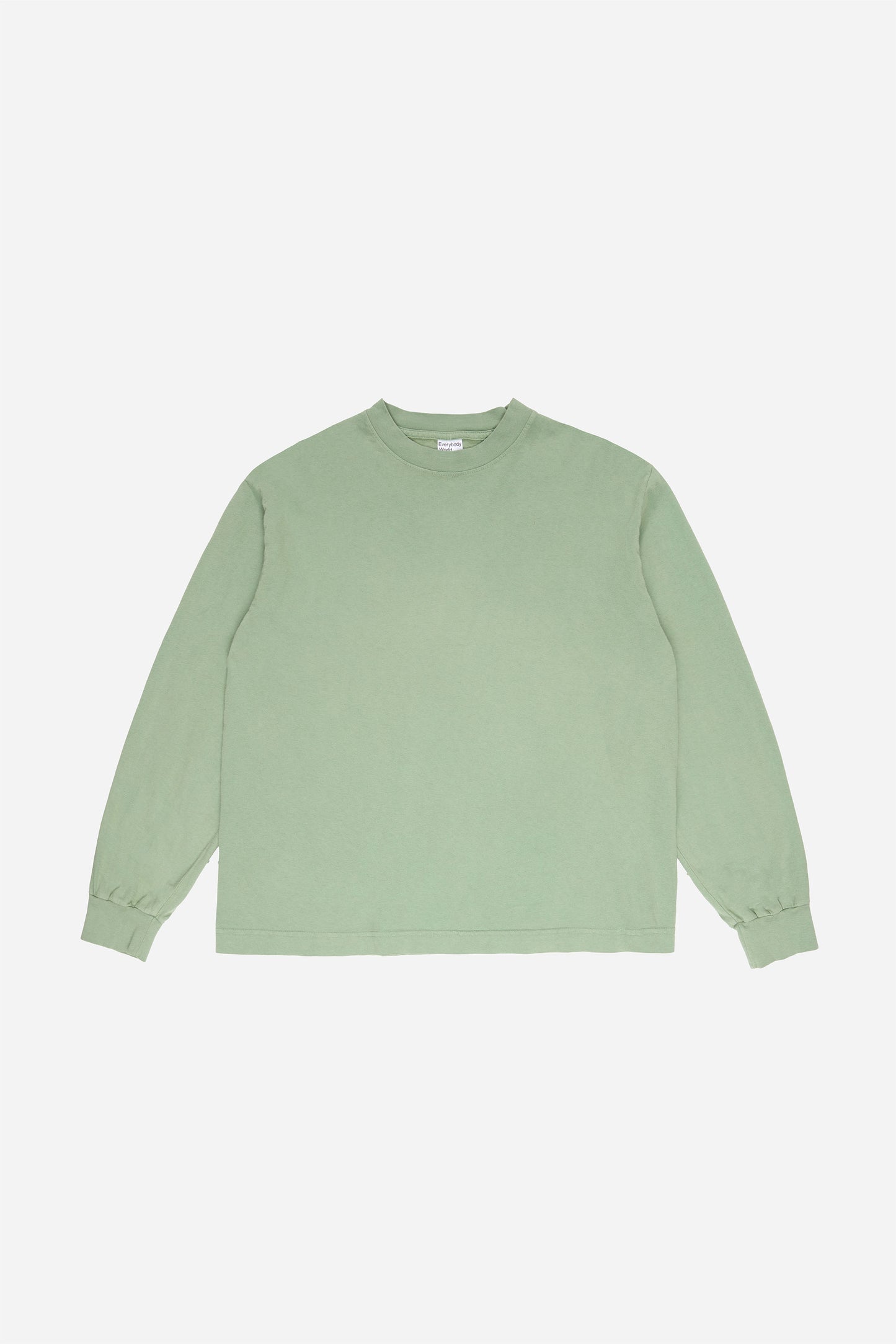 Flat lay of Wasabi Long Sleeve Boxier Trash Tee showing the cropped boxy silhouette.