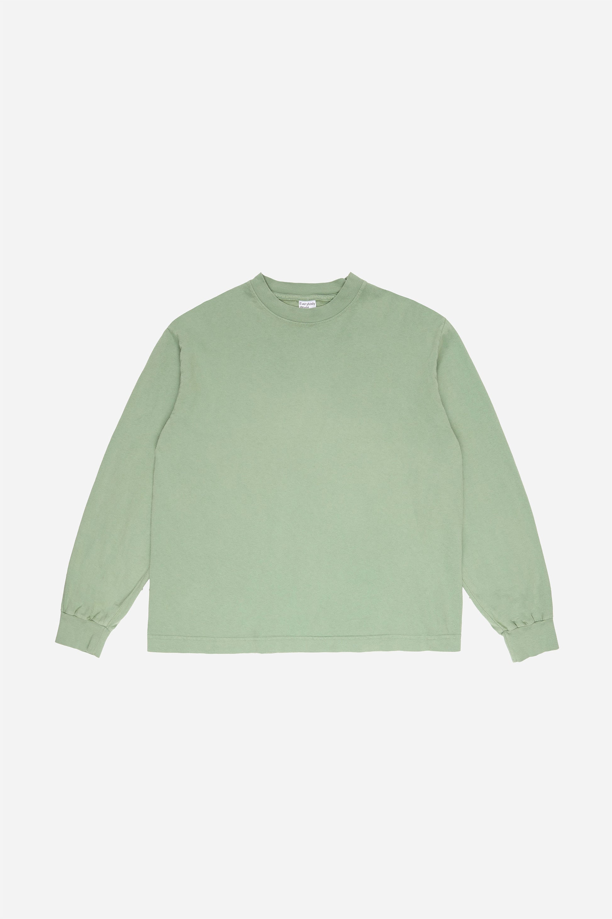 Flat lay of Wasabi Long Sleeve Boxier Trash Tee showing the cropped boxy silhouette.