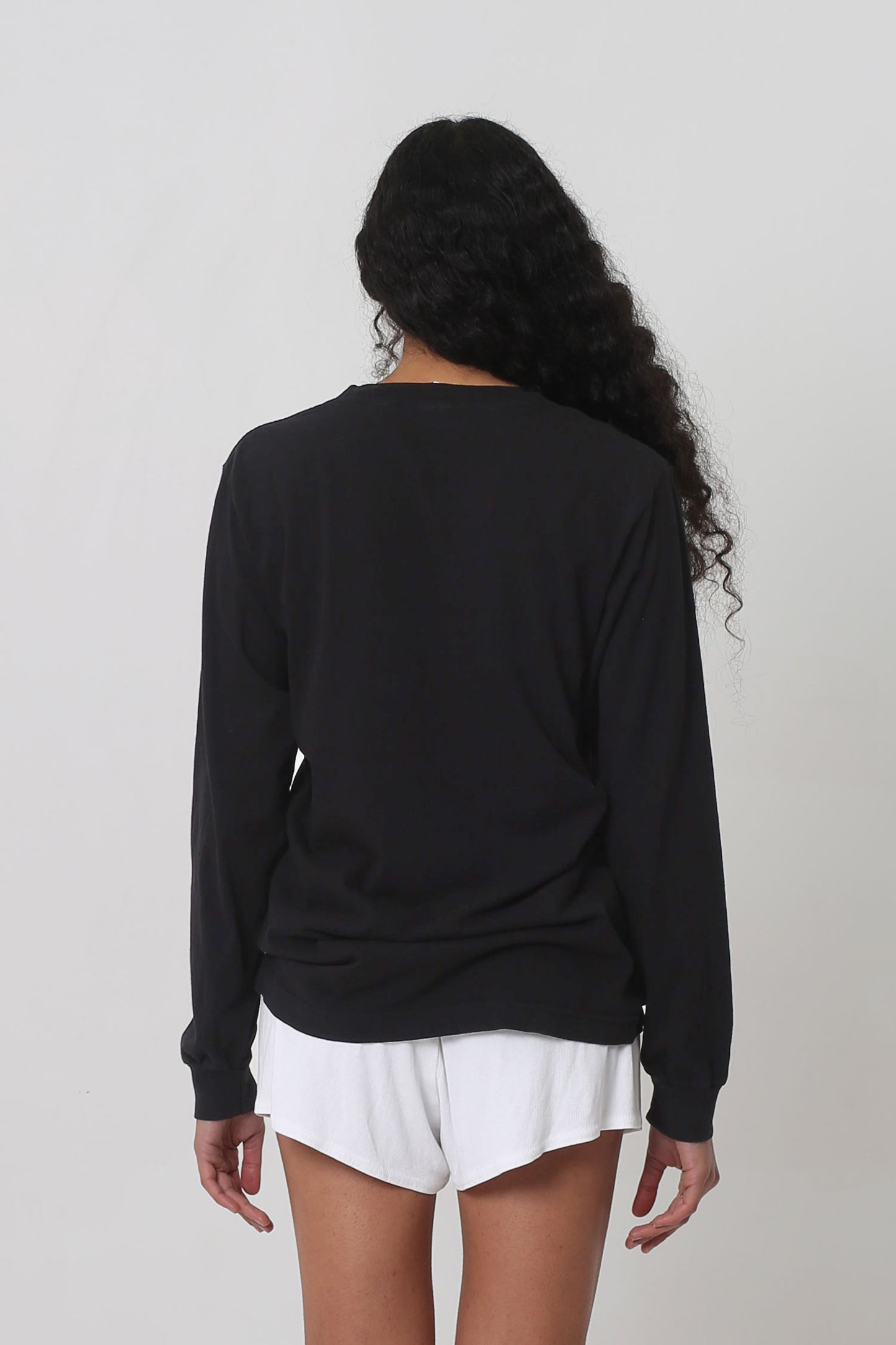 Back view: showing fabric drape and relaxed fit throughout.