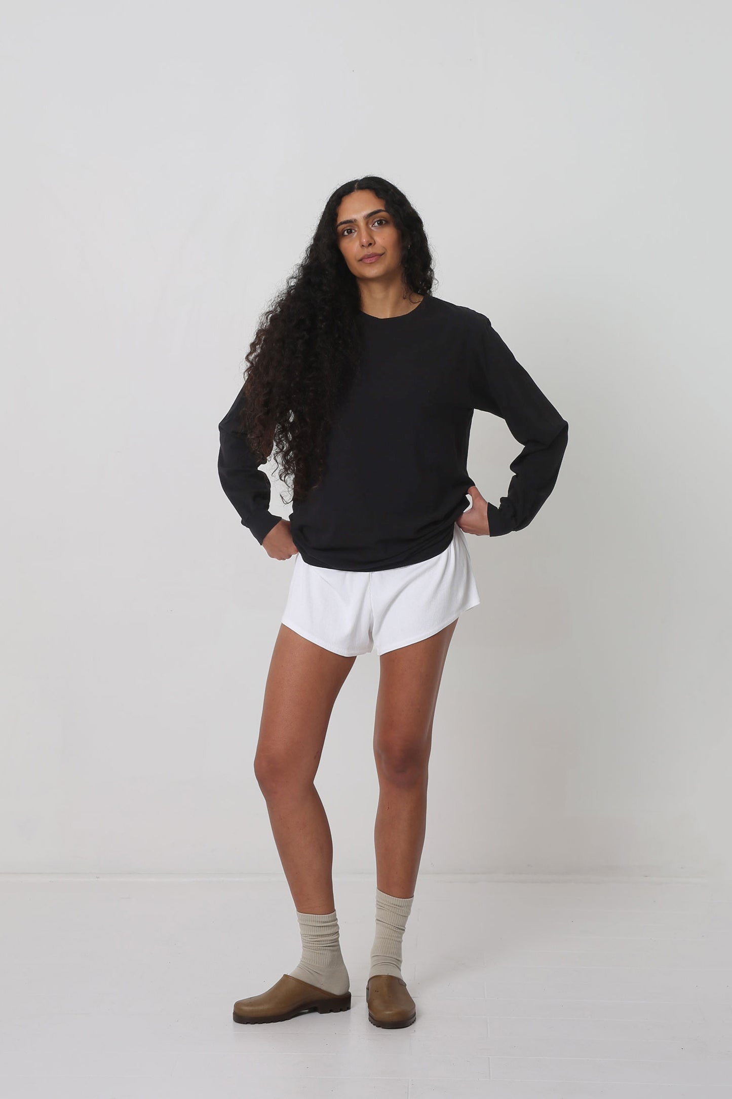 Styled with White Rib Shorts, Oat Squishy Socks and Plasticana Opana Mules.