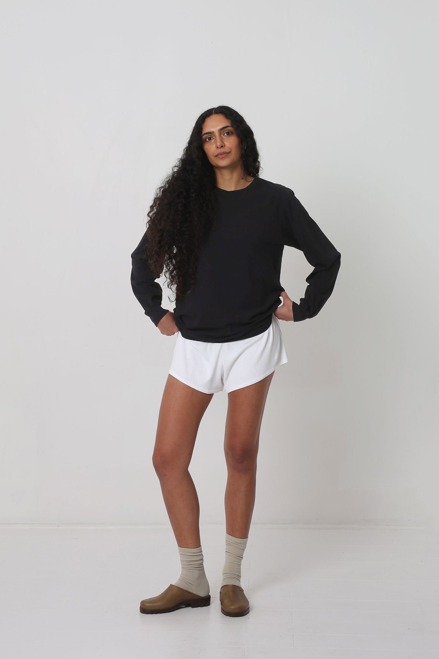 Styled with White Rib Shorts, Oat Squishy Socks and Plasticana Opana Mules.