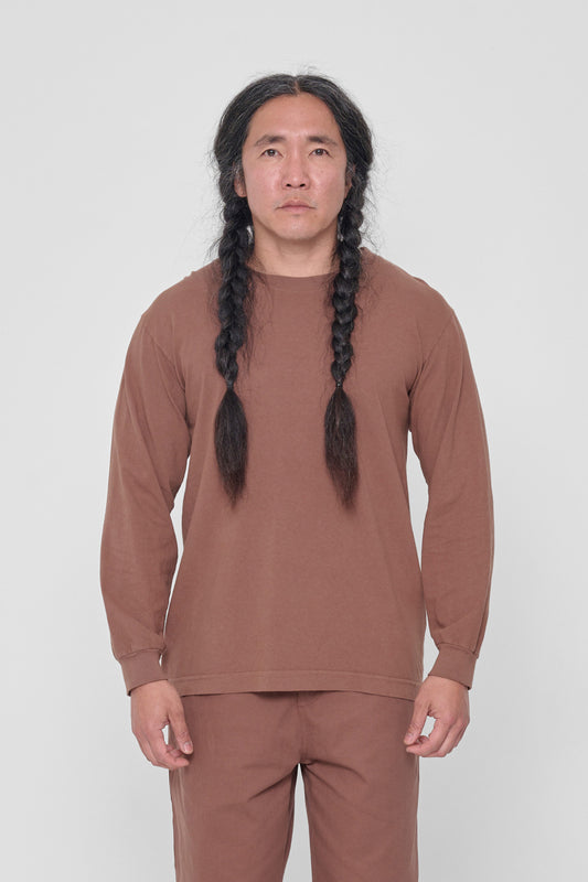 A 5'11" man in a Potting Soil Long Sleeve Trash Tee in size M. Hem hits just below his hip.