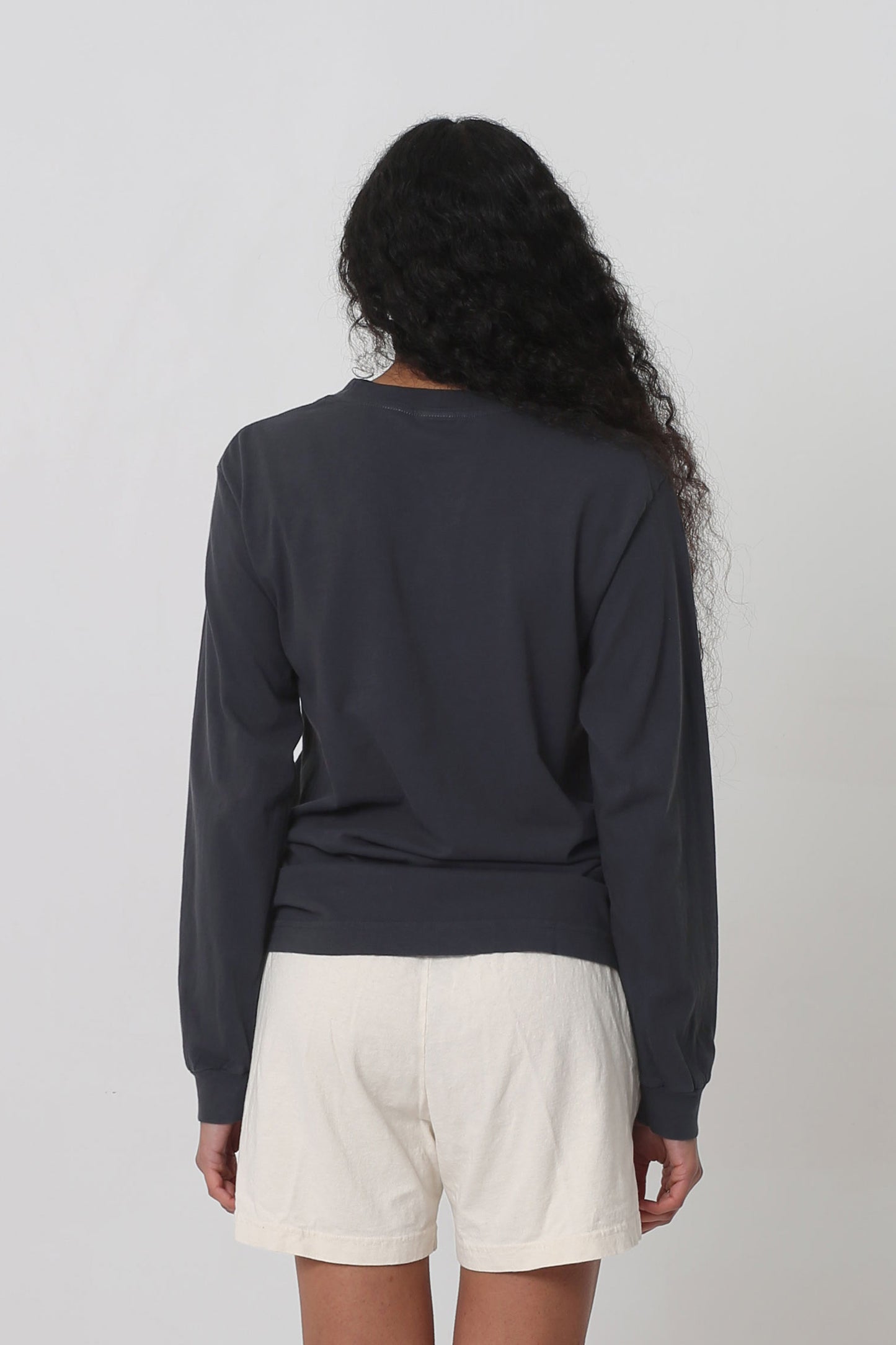 Back view: showing fabric drape and relaxed fit throughout.