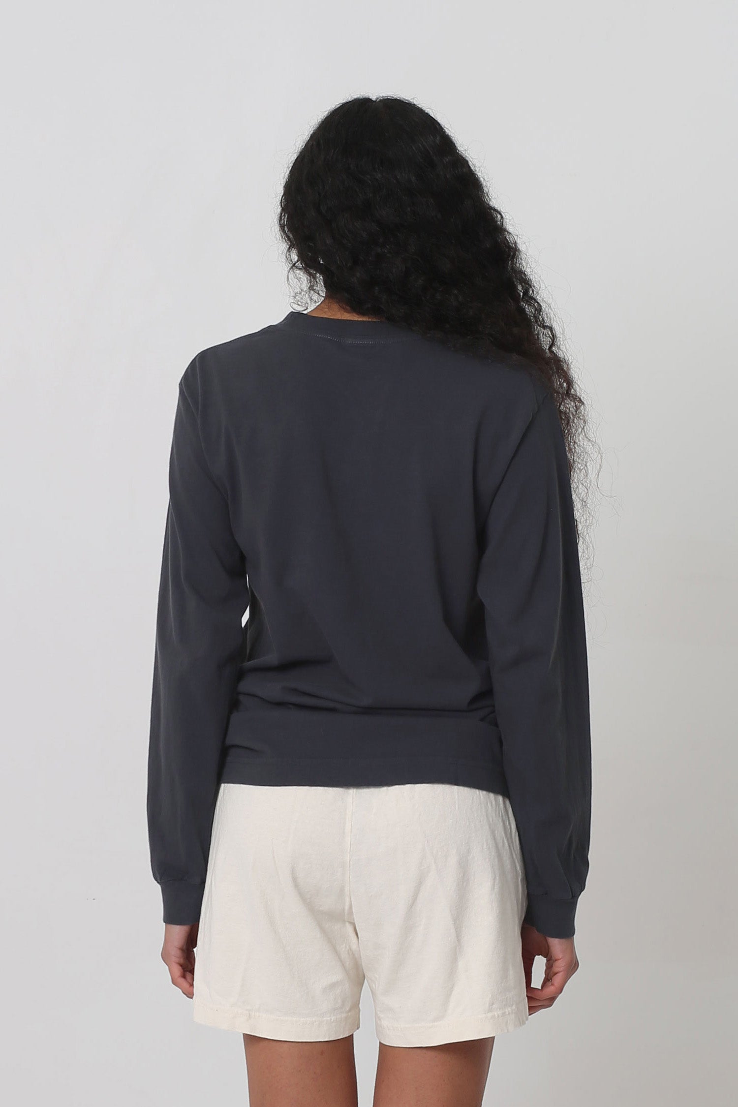 Back view: showing fabric drape and relaxed fit throughout.