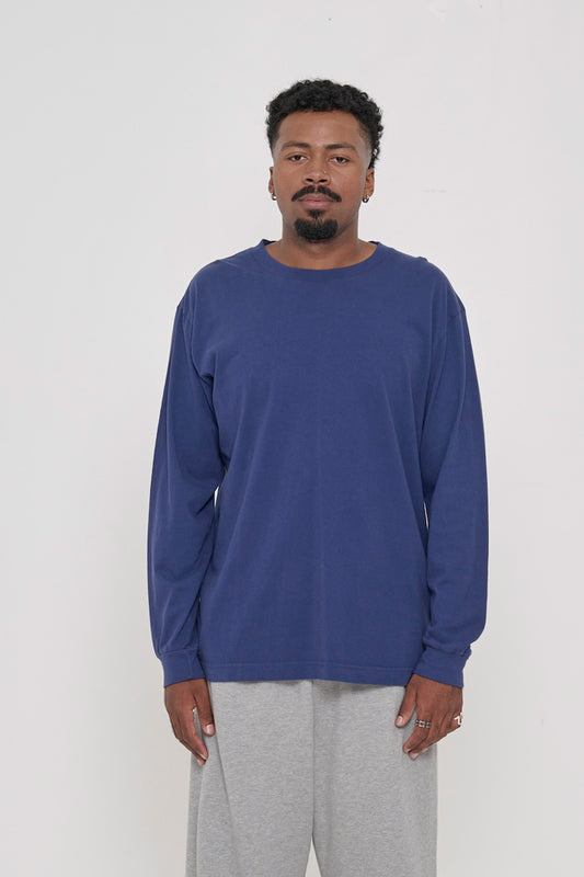 A 6'2" man in a Washed Navy Long Sleeve Boxier Trash Tee in size L. Hem hits just below his hip.