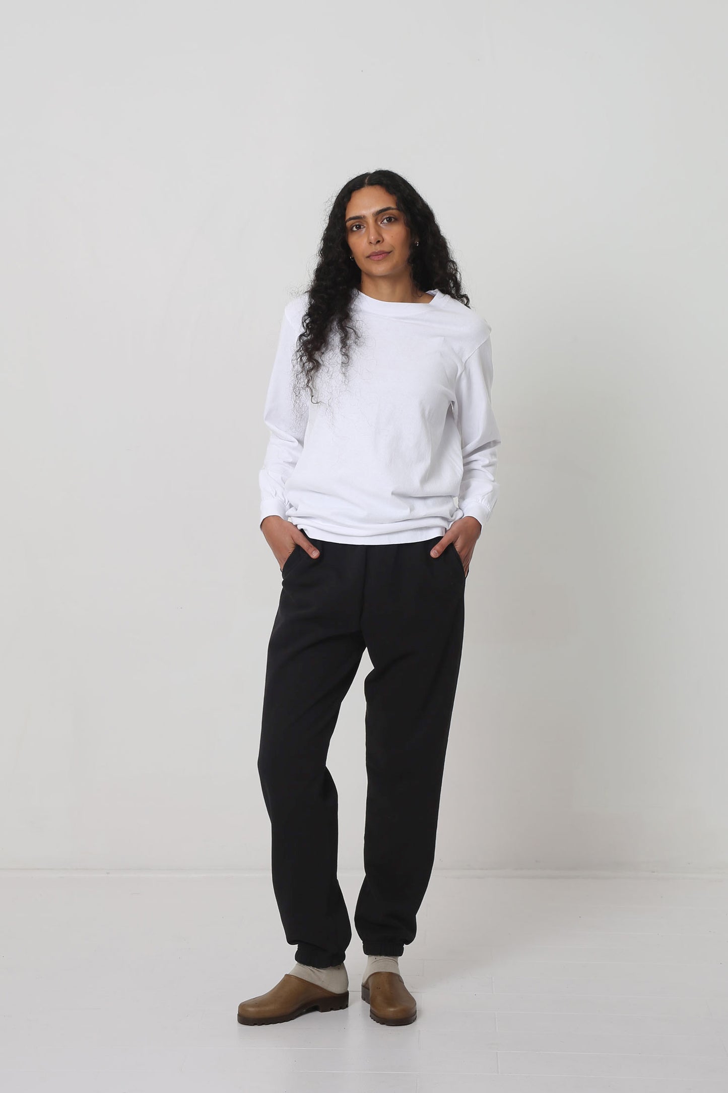 Styled with Black Trash Sweaptants, Oat Squishy Socks and Plasticana Opana Mules.